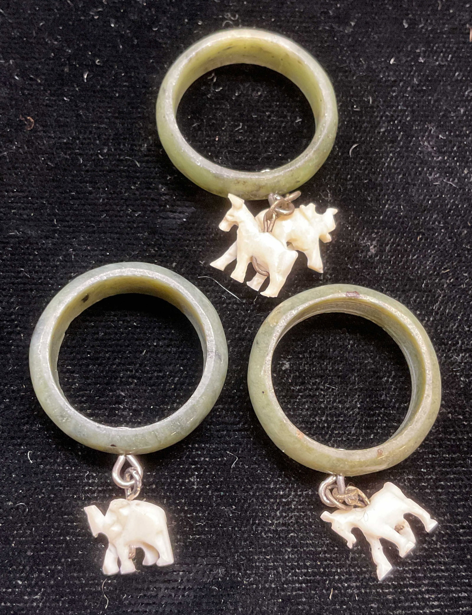 Lot 3 Nephrite Jade & Bone Animal Pendants: Lot of 3 carved nephrite jade pendants with carved bone animal elephant and horse pendants. Measure approx .75 inches wide. Some scratching. Jewelry, estate jewelry, semiprecious jewelry, cocktail jew