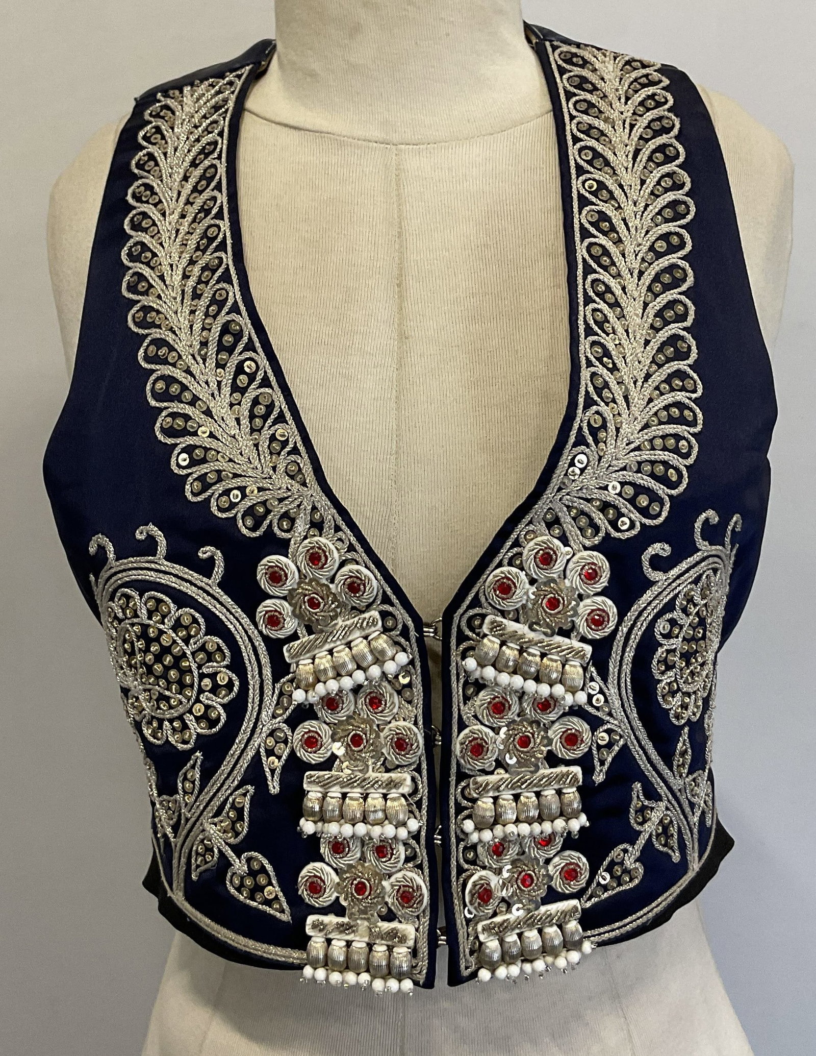 Santos Embroidered & Sequined Vest Spain: Santos embroidered and sequined blue and white vest. Measures approx 15 inches across chest. Made in Spain. Label reads as follows Santos Madrid. Feels like satin. Frontside features silver toned embr