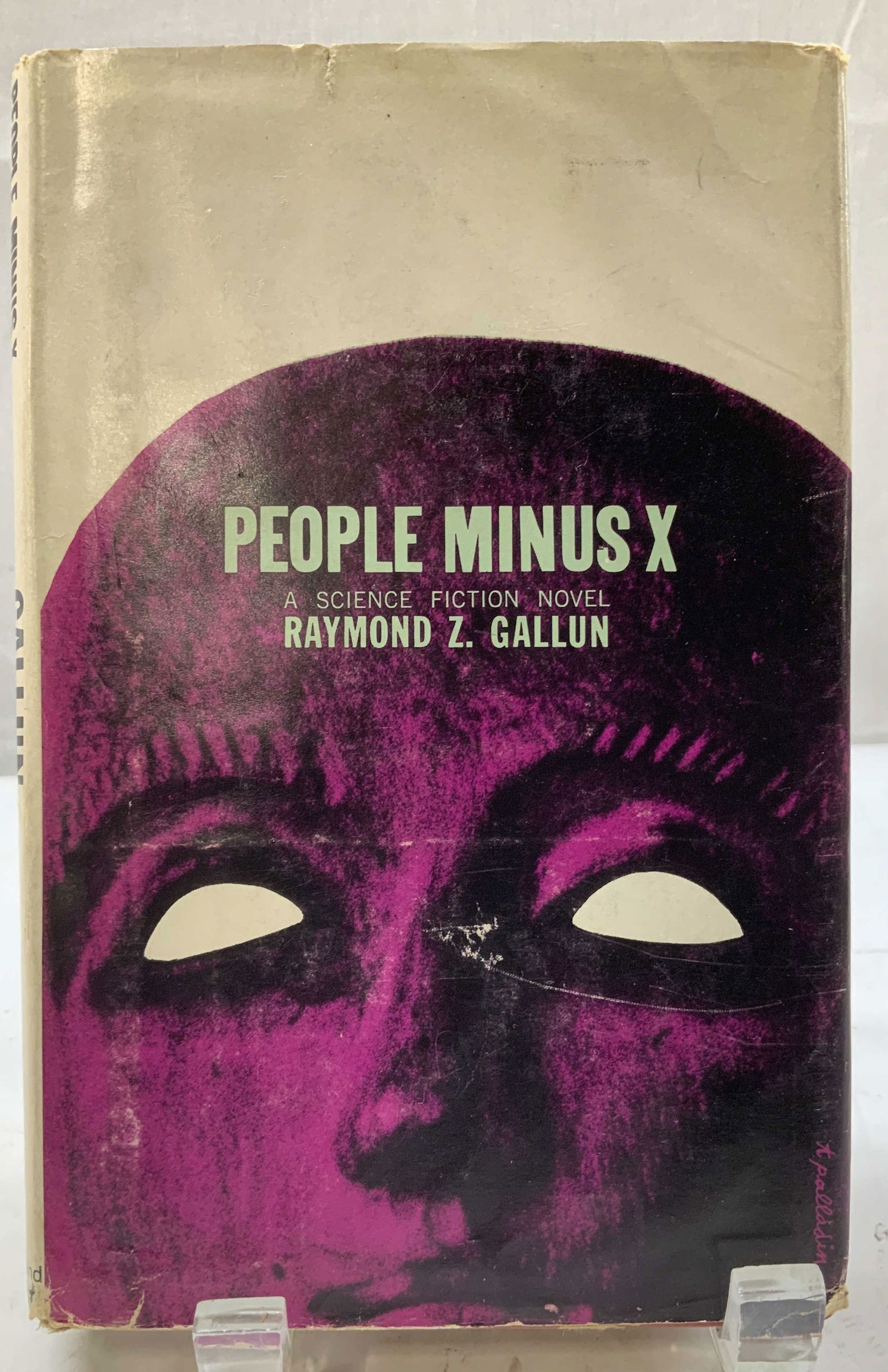1957 People Minus X First Printing Novel GALLUN: People Minus X. A science fiction novel by Raymond Z. Gallun. Simon & Schuster. New York. 1957. First Printing. Front cover features illustrations of a purple figure. Surface wear consistent to age, u