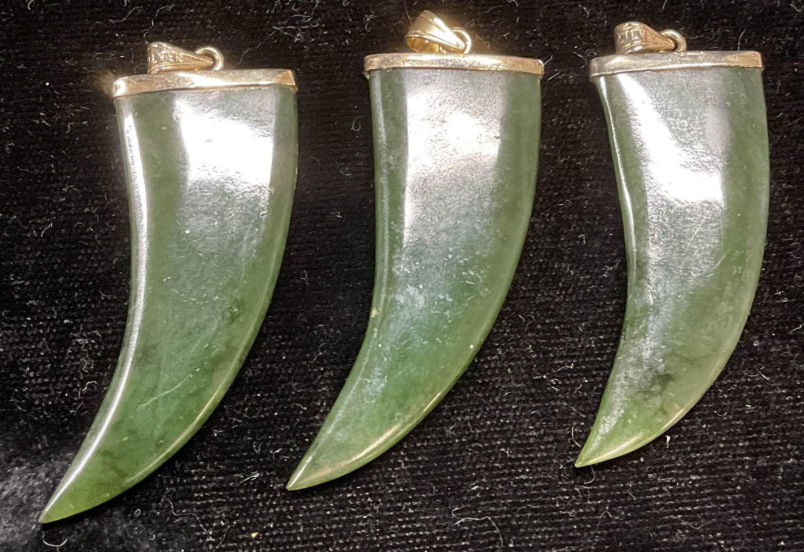 Lot 3 Nephrite Jade Claw Pendants: Lot of 3 carved nephrite jade claw motif pendants. Measure approx 1.75 x .75 inches. Some scratching. Jewelry, estate jewelry, semiprecious jewelry, cocktail jewelry, fashion jewelry, accessories, fas