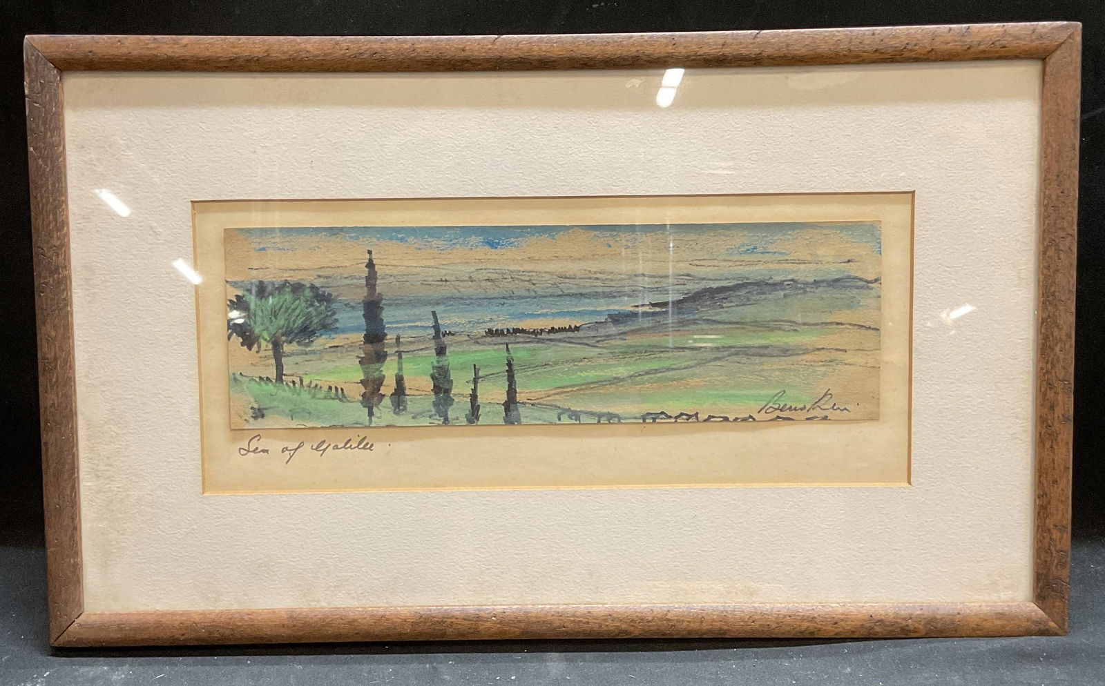 Sgn B. R. Sea of Galilee Watercolor Painting: Framed and matted watercolor painting on paper. Signed lower right, illegible, initials B. R. Sea of Galilee. Landscape with trees and water. Wood frame. Not examined out of frame. Frame measures appr