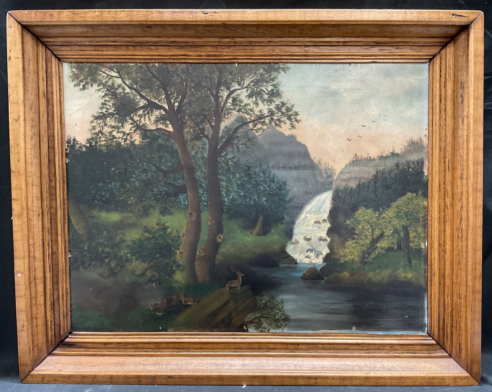 Framed Landscape Deer Waterfall Oil Painting 30in: Framed oil on board painting. No visible signature. Landscape with deer and waterfall. Wood frame. Not examined out of frame. Frame measures approx 24 x 30 inches. Wear including residue and scratchin
