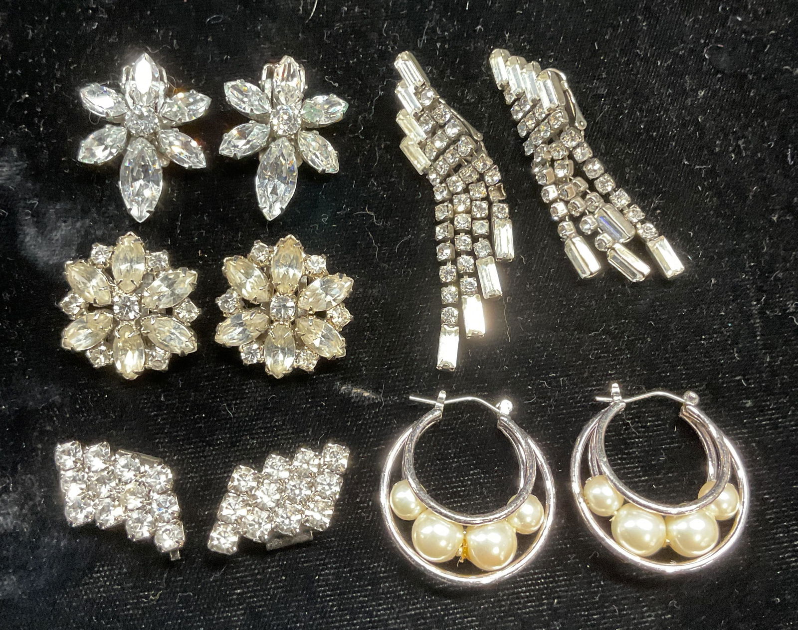 Lot 5 Vtg Crystal Earrings & Shoe Clips: Lot of 5 pairs of vintage earrings and shoe clips. Silver tone with crystal and faux pearls. Largest pair measure approximately 2.25 inches long. Some scratching. Some crystals need replacement. Jewel