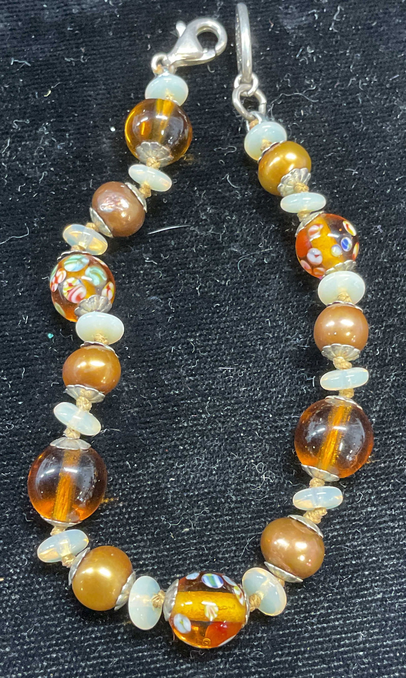 Elizabeth Errico Pearl & Glass Beaded Bracelet: Signed Elizabeth Errico Pearl and amber and opaque white glass beaded bracelet. Measures approx 6.75 inches long. Some scratching. Jewelry, estate jewelry, costume jewelry, cocktail jewelry, fashion j