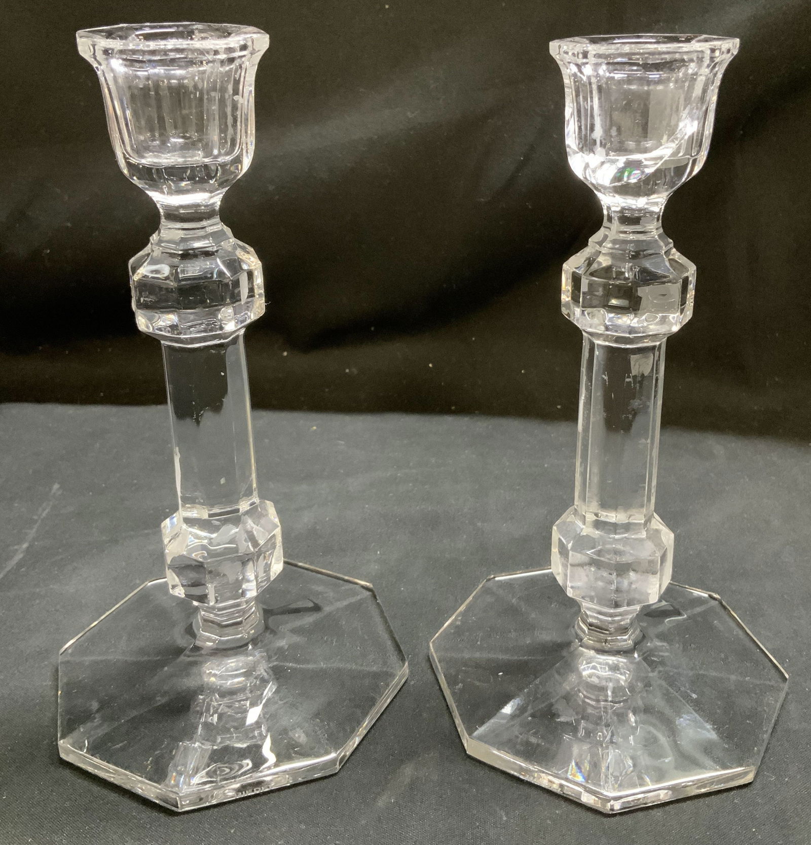 Vtg Pair Biedet Clear Crystal Candlesticks: Candle sticks feature faceted stems, octagonal bases & flared tulip style candle cups. Signed & marked on underside. Reads, BIEDET. Surface wear consistent to age, use & exposure. Measurements: length