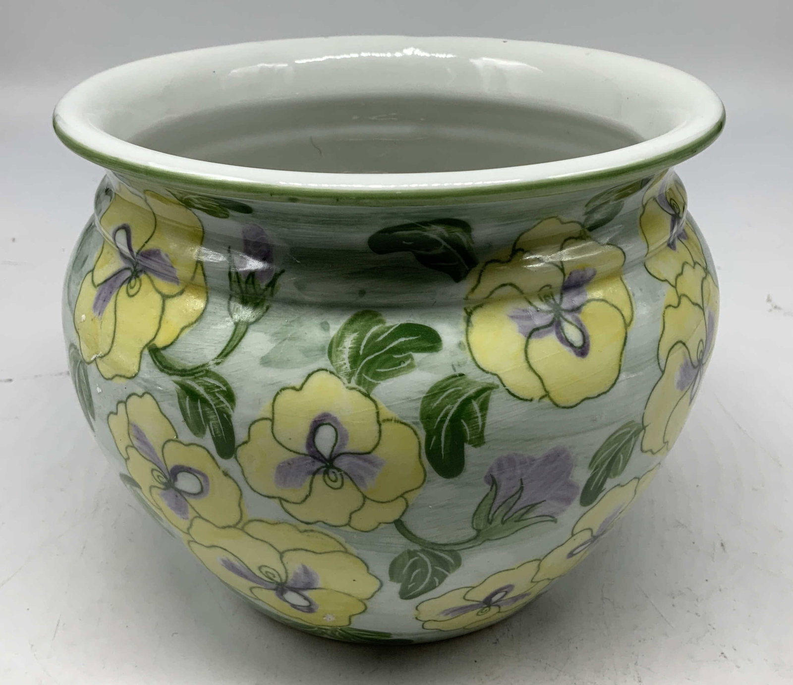 Andrea By Sadek Yellow Floral Motif Cachepot: Cachepot is porcelain & features hand-painted yellow floral motifs. Yellow, green & purple tones. Signed & marked. Reads, Andrea by SADEK. Surface wear consistent to age, use & exposure. Measurements: