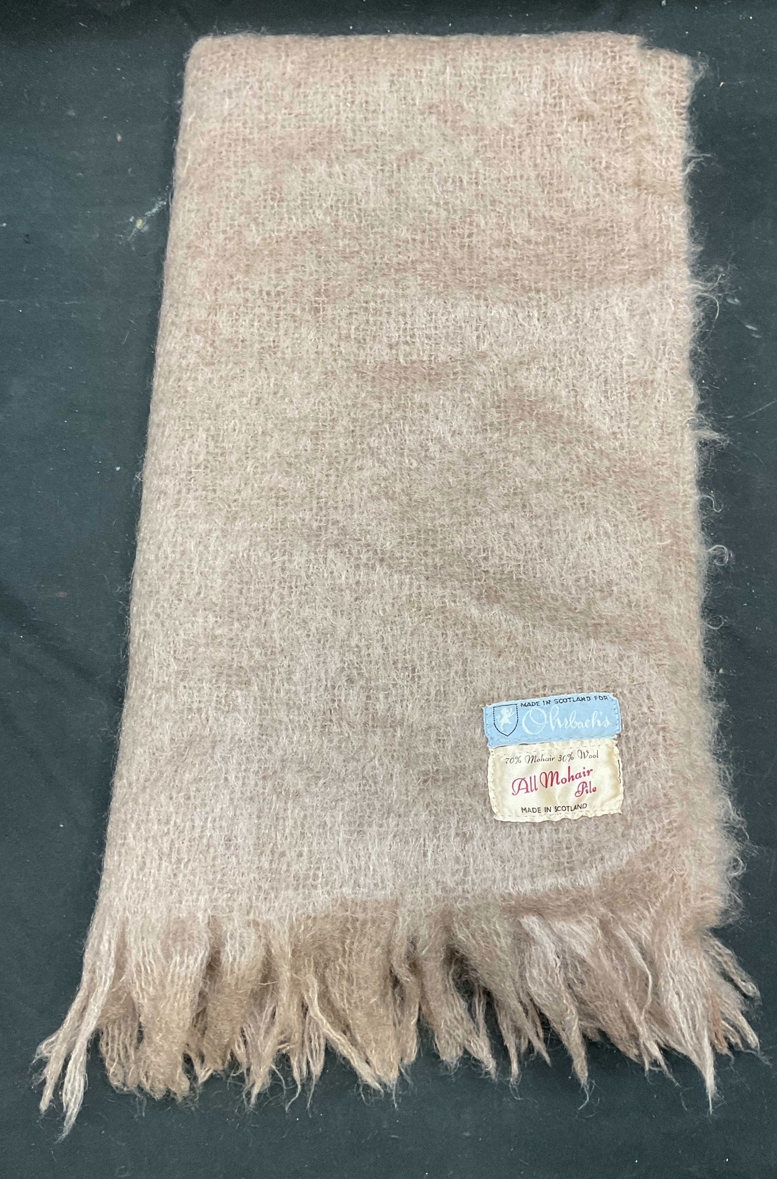 Vtg Ohrbachs Beige Mohair Scarf, Scotland: Vintage beige mohair scarf made for Ohrbachs department store, New York City. Made in Scotland. Wool and mohair. Measures approx 66 inches long. Some shedding and pilling. Ohrbachs scarf, designer sca
