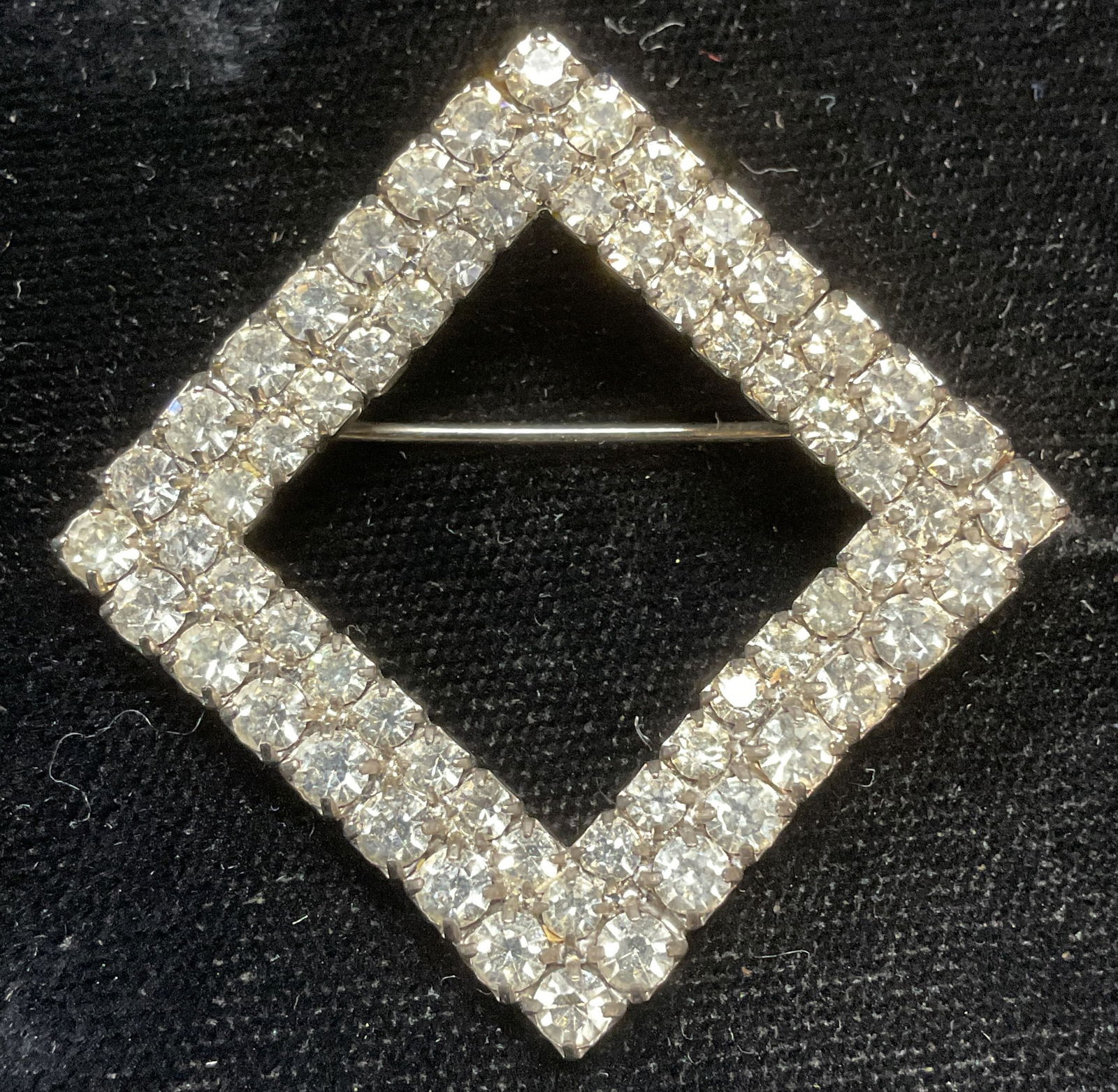 Silver Tone Crystal Open Diamond Brooch: Silver tone colorless crystal open diamond shaped brooch. Measures approx 1.5 x 1.5 inches. Some scratching. Jewelry, estate jewelry, costume jewelry, cocktail jewelry, fashion jewelry, accessories, f