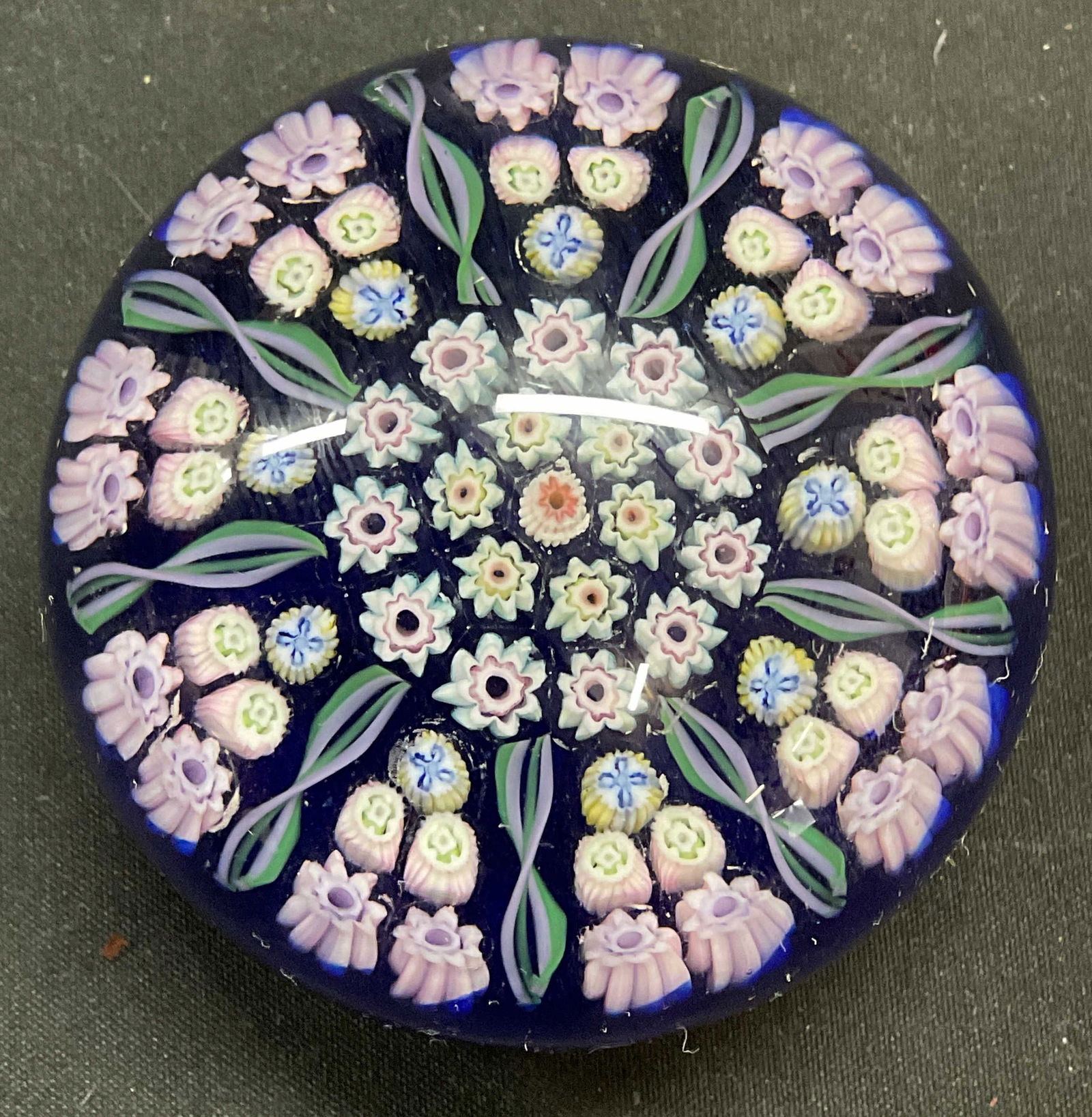 Vtg Hand Blown Millefiori Art Glass Paperweight: Vintage hand blown art glass paperweight. Millefiori floral design. Blue, pink, yellow, green. Style of Perthshire Paperweights, no signature or marks. Measures approx 2.5 x 1.75 inches. Some wear con