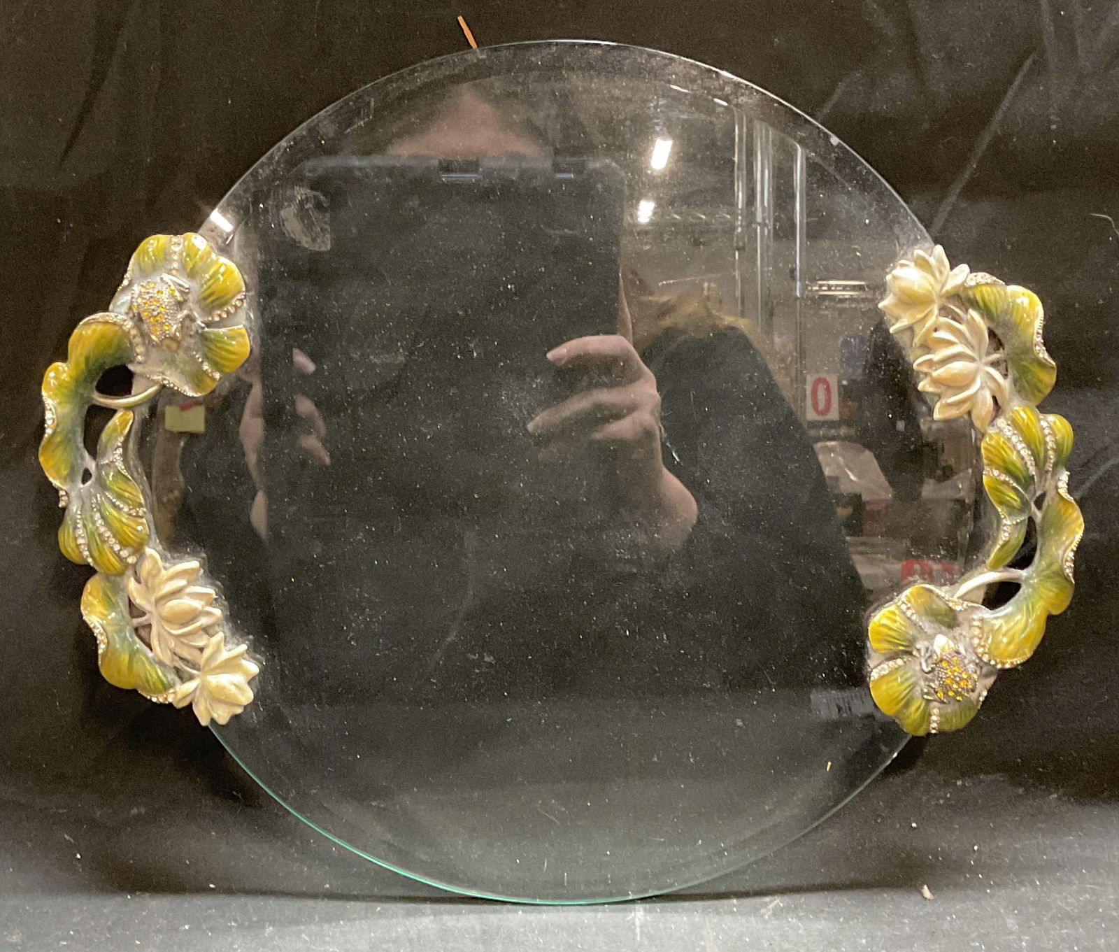 Enamel Crystal Flower Glass Vanity Tray: Round glass vanity tray with enameled metal and crystal decorated flower motif handles. Style of Michael Aram. Not visible signatures. Measures approx 14 x 12 inches. Some scratches. Vanity tray, glas