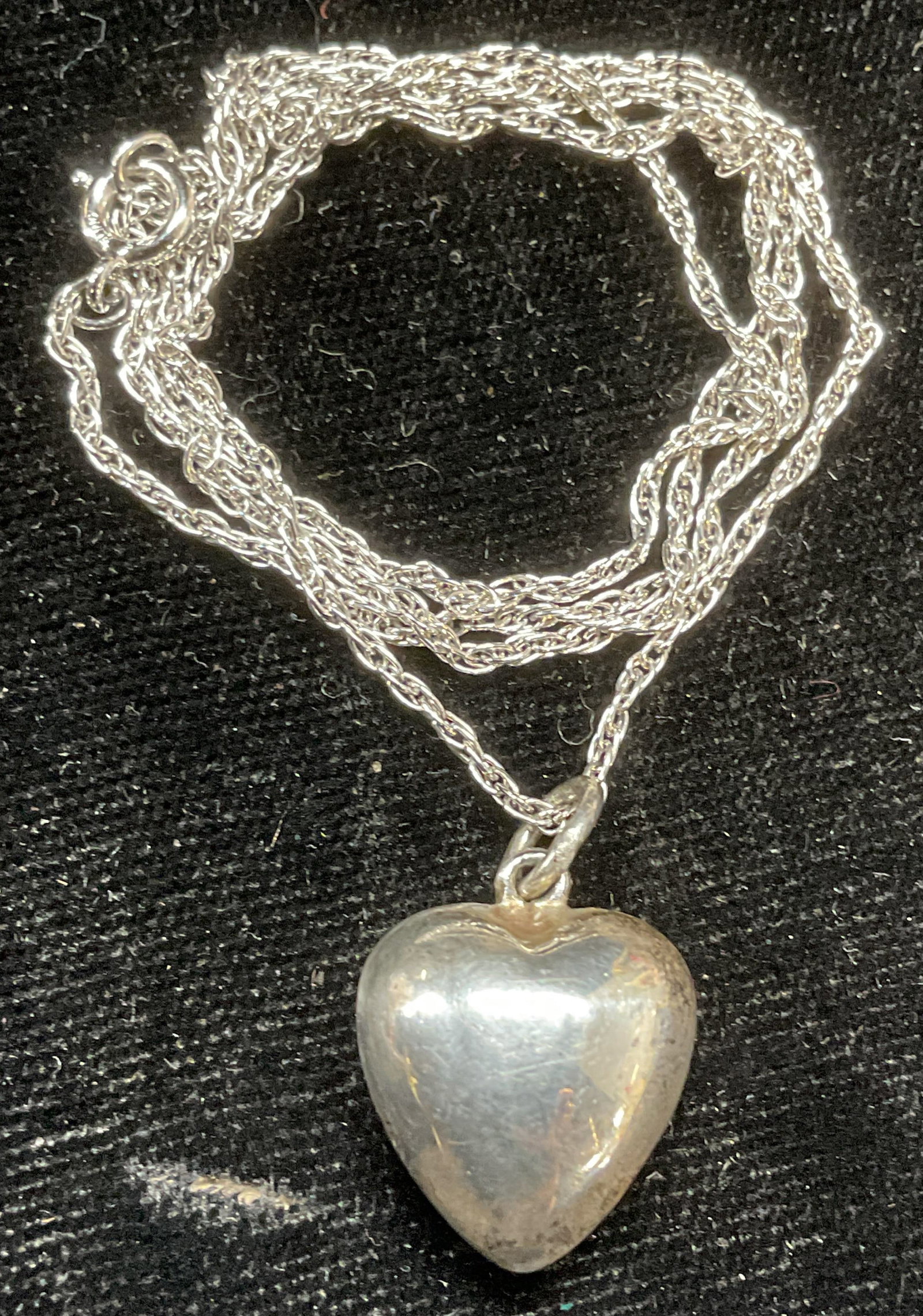 Sterling Silver Heart Pendant Necklace: Sterling silver chain necklace with sterling silver heart pendant. Marked sterling. Drop length approx 8.75 inches. Total weight 3.5 grams. Some scratching. Jewelry, estate jewelry, fine jewelry, cock
