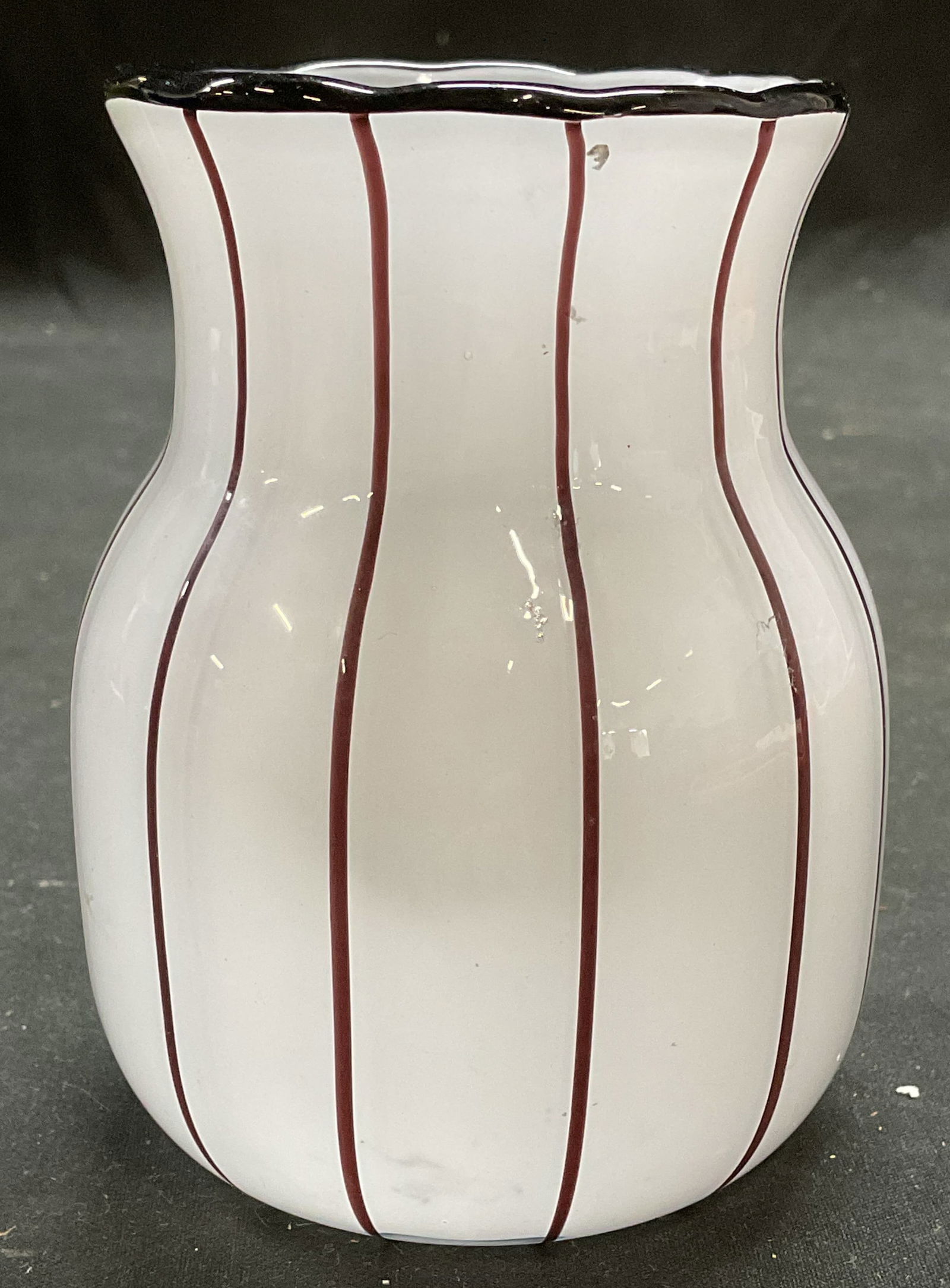 Antique Powolny Loetz Opaline Art Glass Vase: Antique hand blown art glass vase. Tango glass. Opaline white glass with black stripe and rim overlay. Style of Michael Powolny for Loetz. No visible signature or marks. Measures approx 3 x 4 inches.