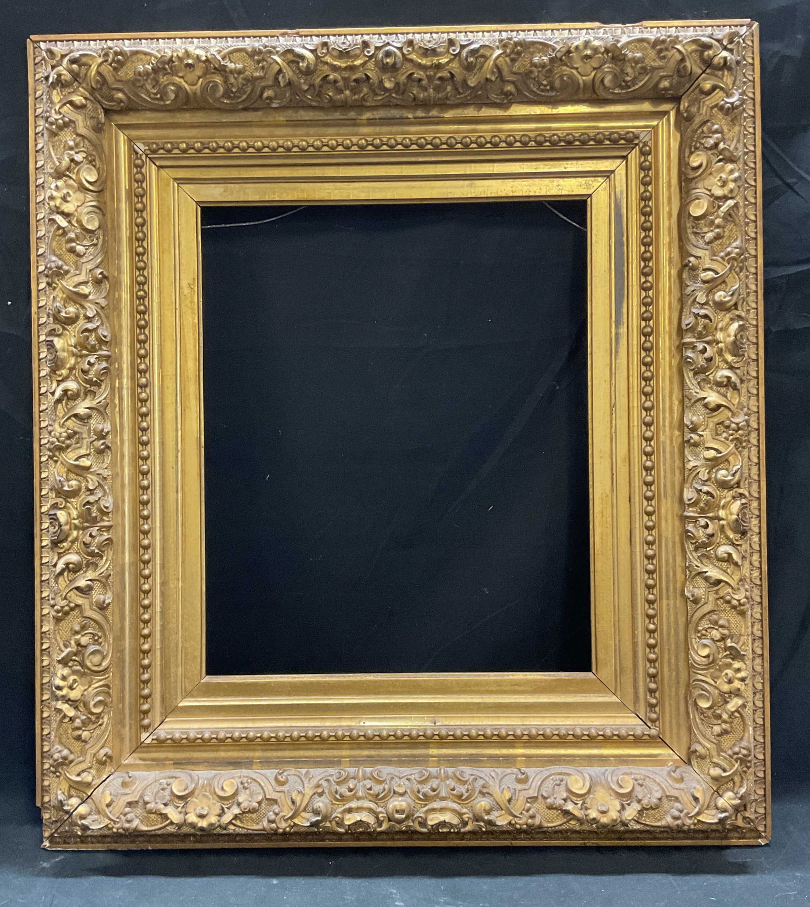 Vtg Ornate Hilt Wood Frame, 28.5x25.5 Inches: Vintage, possibly antique, gilt wood frame. Orange raised floral scroll design. Measures approx 28.5 x 25.5 inches. Wear including some chips and hairlines. Frame, vintage frame, gilt wood frame, orna