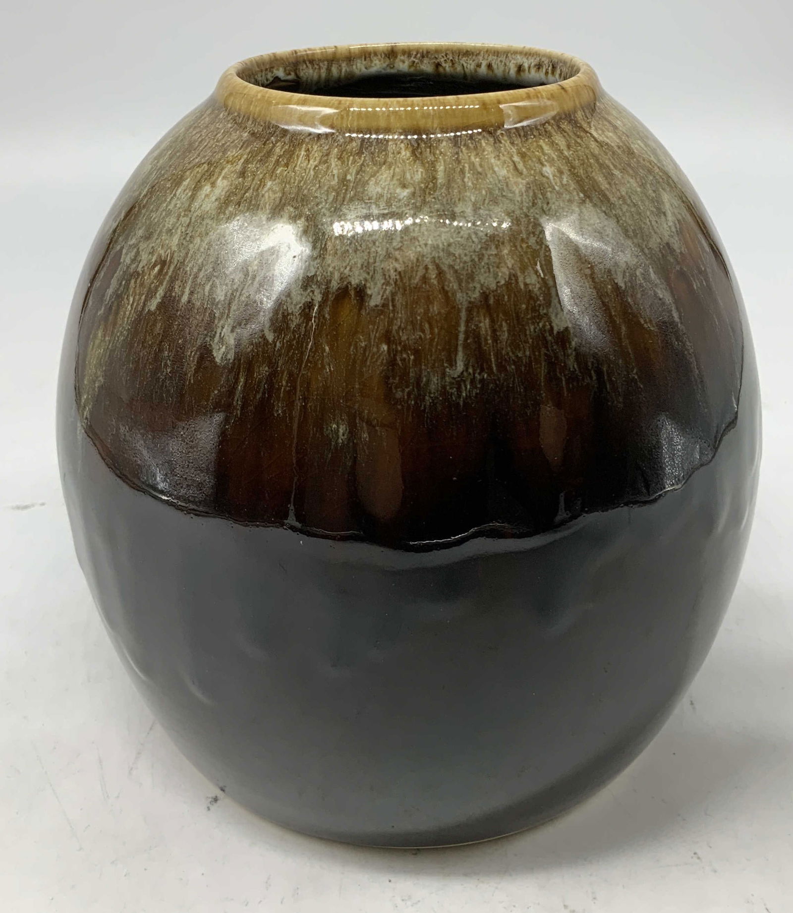 Tozai Hand Painted Brown Drip Glaze Vase: Vase is ceramic & features hand-painted mottled drip glaze w shades of brown & tan. Glossy finish. Surface wear consistent to age, use & exposure. Measurements: length 2.4in x width 2.4in x height 6in