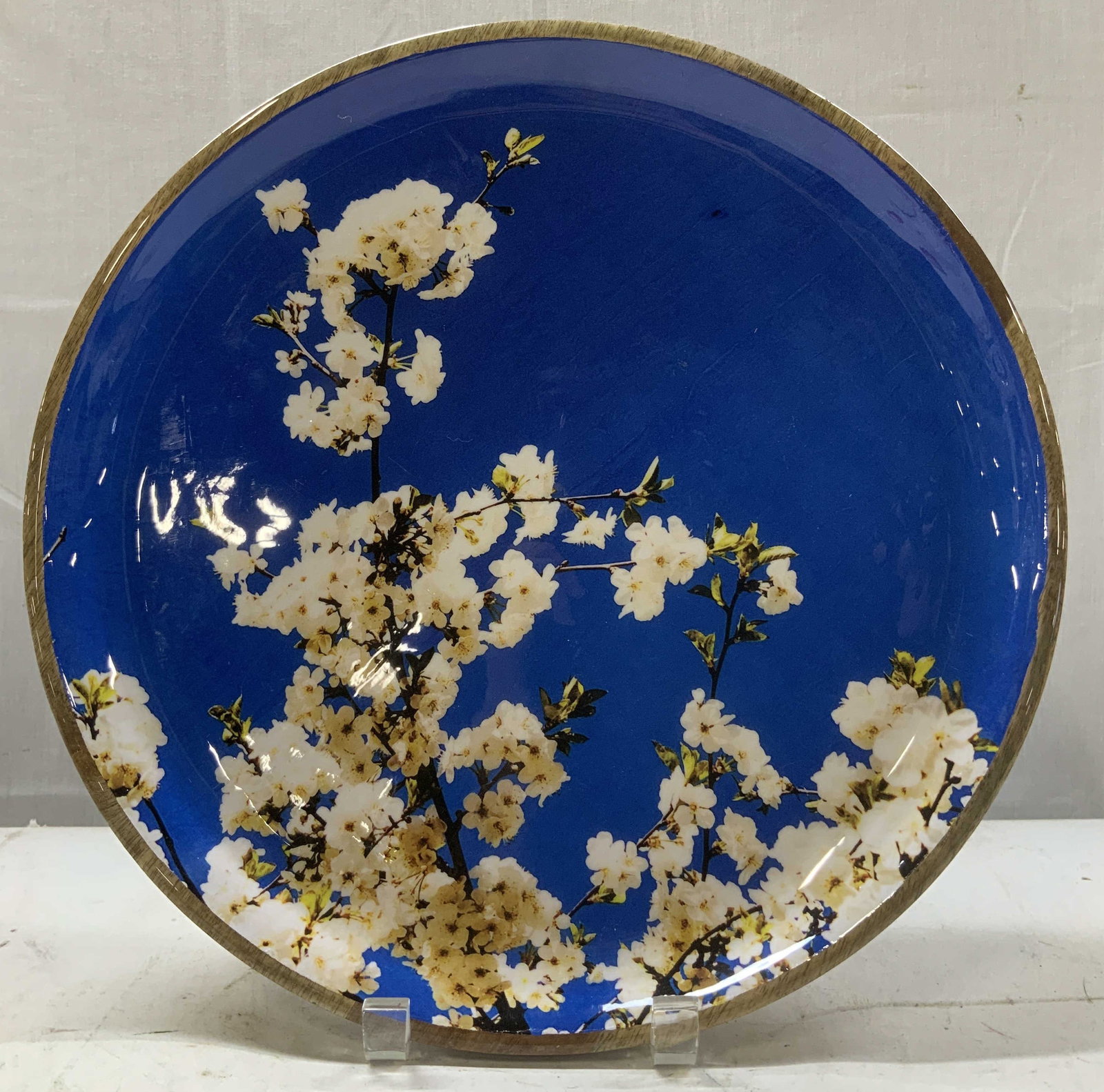 Ali Art & Crafts Almond Blossoms Deco Tray INDIA: Decorative tray features white blossoming branches against a blue background. Tray is wooden & enamel material. Signed & marked on underside. Reads, ALI ART & CRAFTS. MADE IN INDIA. Surface wear consi