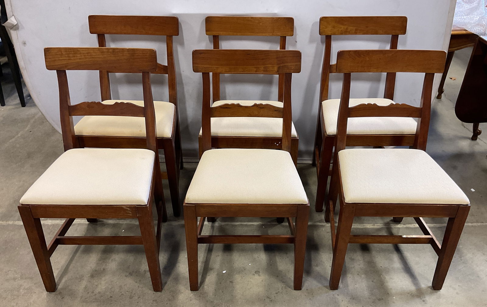 Set 6 Vtg STICKLEY Cherry Wood Dining Chairs USA: Set of 6 vintage Stickley Cherry wood dining. Decorative carved wood backrests with curved design. Upholstered white fabric seats. Signed. Made in USA. Measure approx 18 x 15.5 x 33 inches. Some scrat