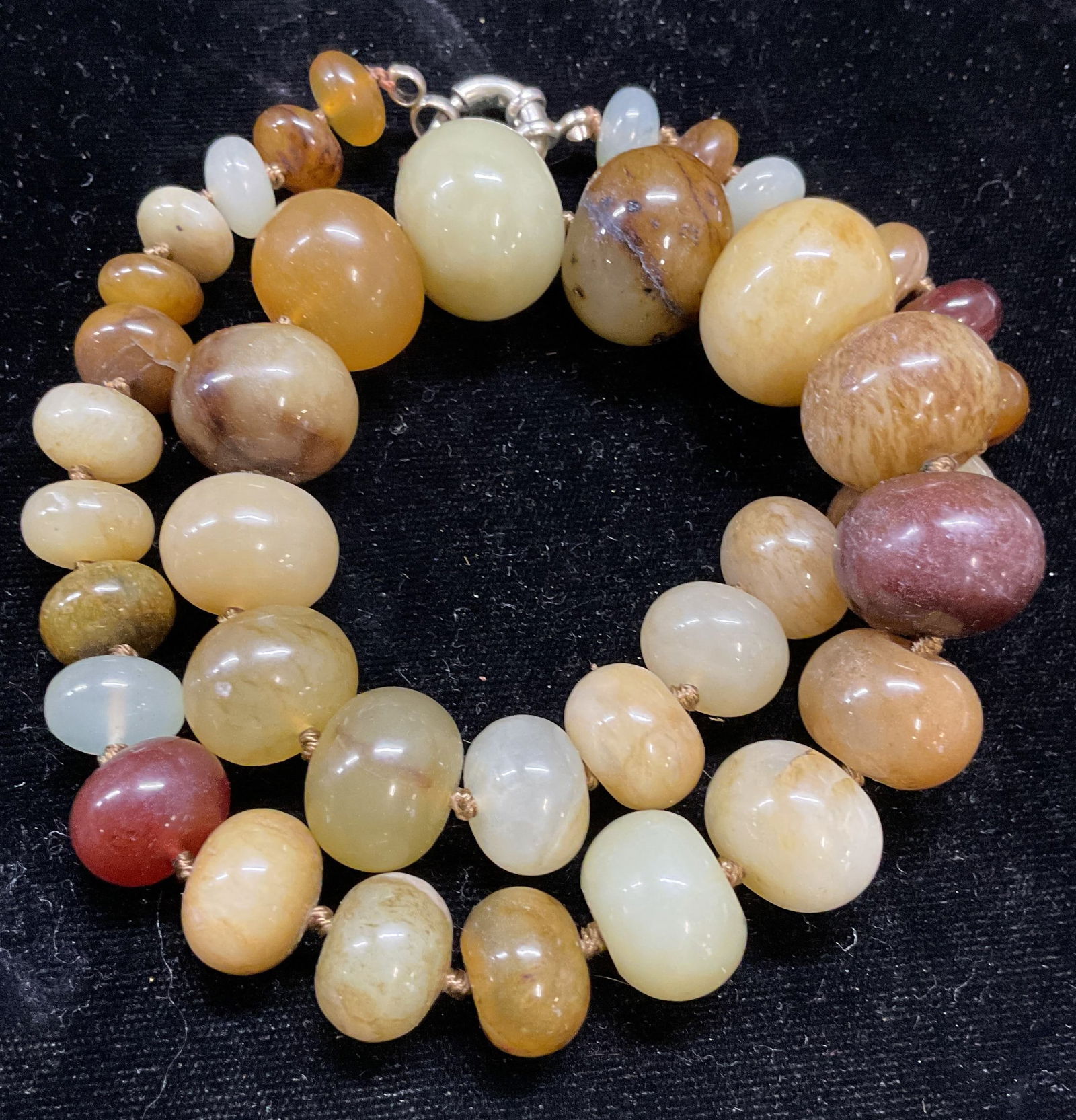 Green & Red Semiprecious Beaded Necklace: Semiprecious beaded necklace. Green, red, blue, brown toned polished stones. Drop length approx 8.5 inches. Total weight 138 grams. Some scratching. Jewelry, estate jewelry, fine jewelry, cocktail jew