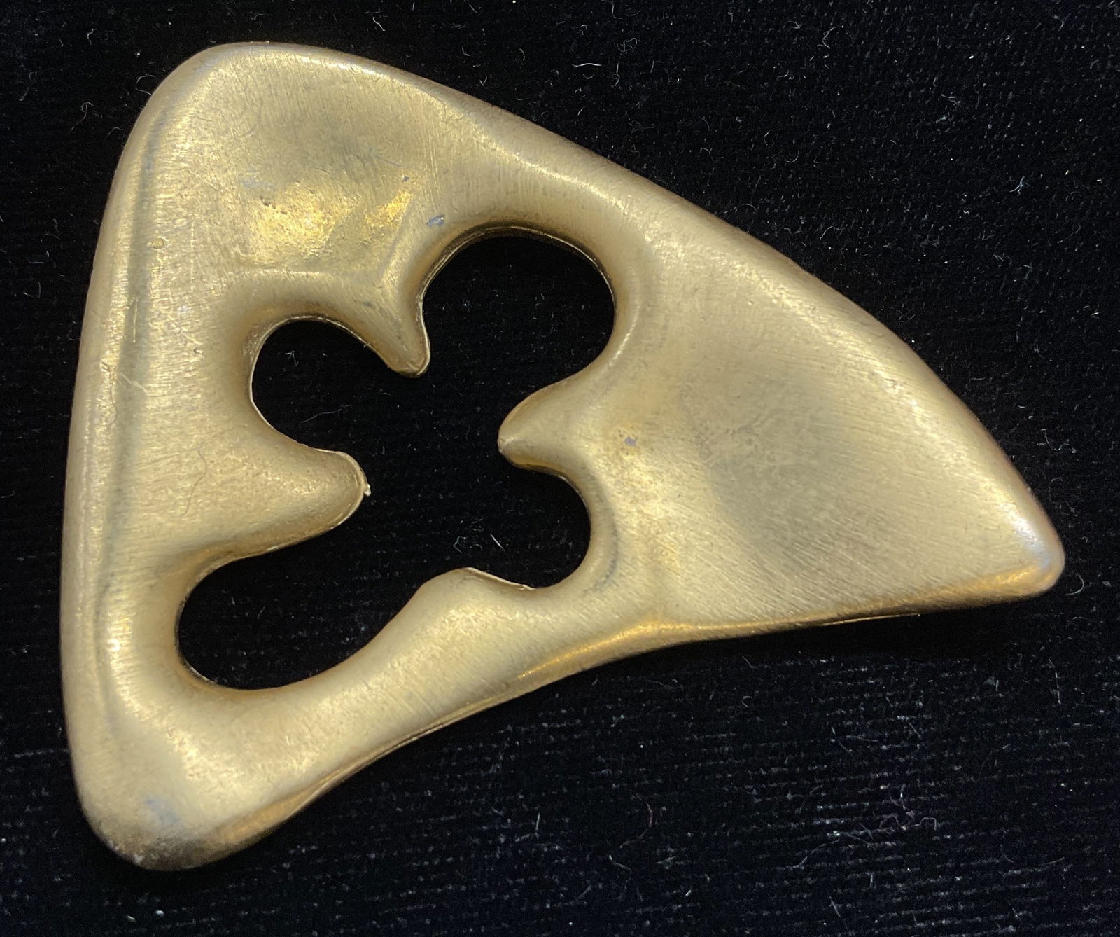 Alexis Kirk Gold Tone Modernist Pendant: Signed Alexis Kirk gold tone modernist pendant. Reticulated organic shape. Measures approx 2.5 x 2 inches. Some scratching. Jewelry, estate jewelry, costume jewelry, cocktail jewelry, fashion jewelry,