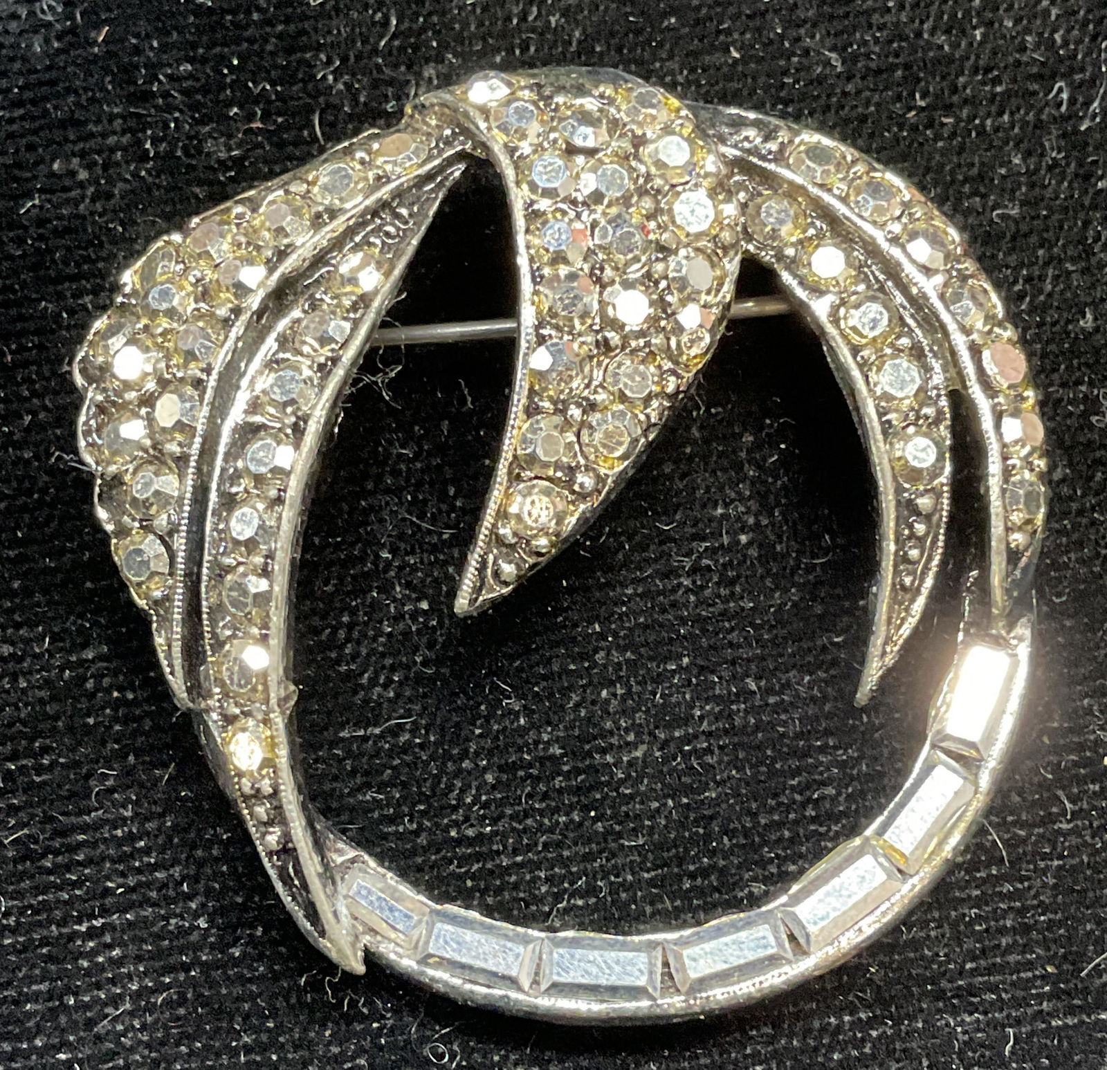 Vintage Silver Tone Crystal Botanical Brooch: Vintage silver tone open circle botanical motif brooch with colorless crystals. Measures approx 1.75 inches wide. Some scratching. Jewelry, estate jewelry, fine jewelry, cocktail jewelry, fashion jewe