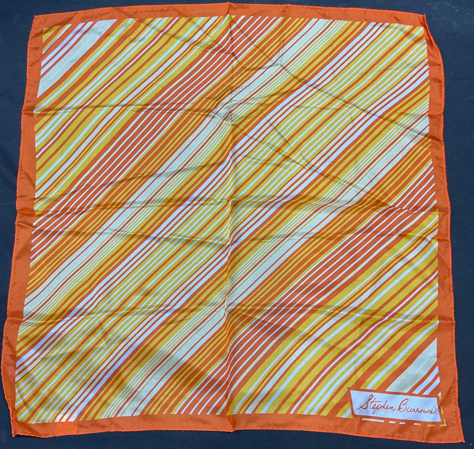 Vtg Stephen Burrows Orange Striped Silk Scarf: Vintage signed Stephen Burrows orange striped print silk scarf. Measures approx 21 x 21 inches. Some wear consistent with exposure. Stephen burrows scarf, designer scarf, silk scarf, orange scarf, acc