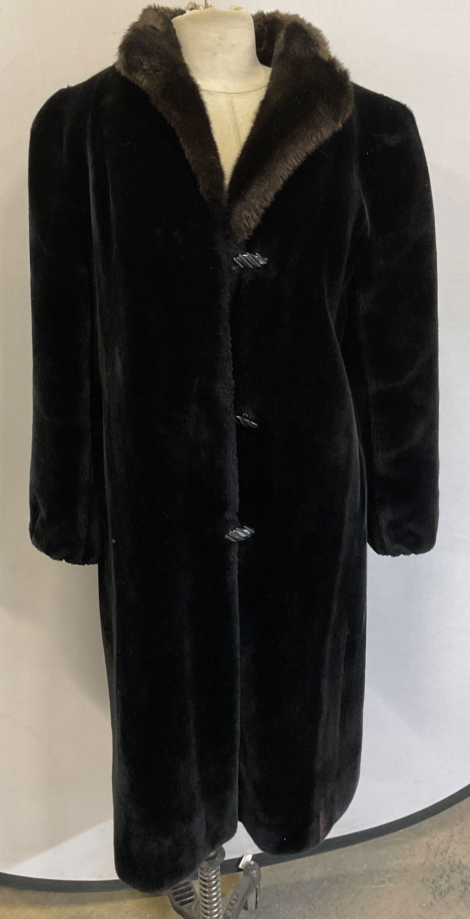 Borgazia Black Faux Fur Coat: Borgazia black faux fur coat. Size 8. Faux fur material. Tag reads as follows Youre Wearing The One And Only Borgazia deep pile fabric by Borg Textiles Styled by Dubrowsky and Perlbinder. Collared jac