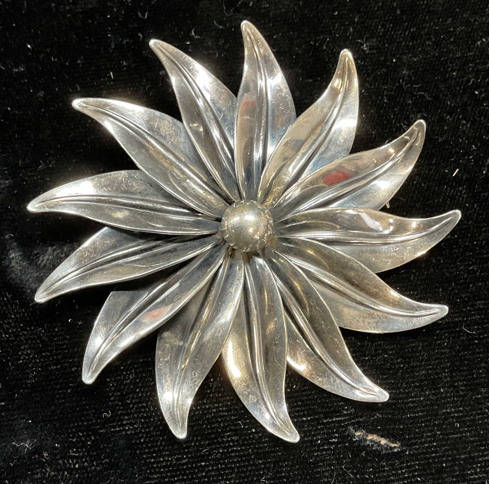 Niels Erik Sterling Silver Flower Brooch, Denmark: Vintage signed Niels Erik N. E. From Denmark Sterling silver flower brooch. Marked sterling. Measures approx 2.75 inches wide. Total weight 18.5 grams. Some scratching. Jewelry, fine jewelry, estate j
