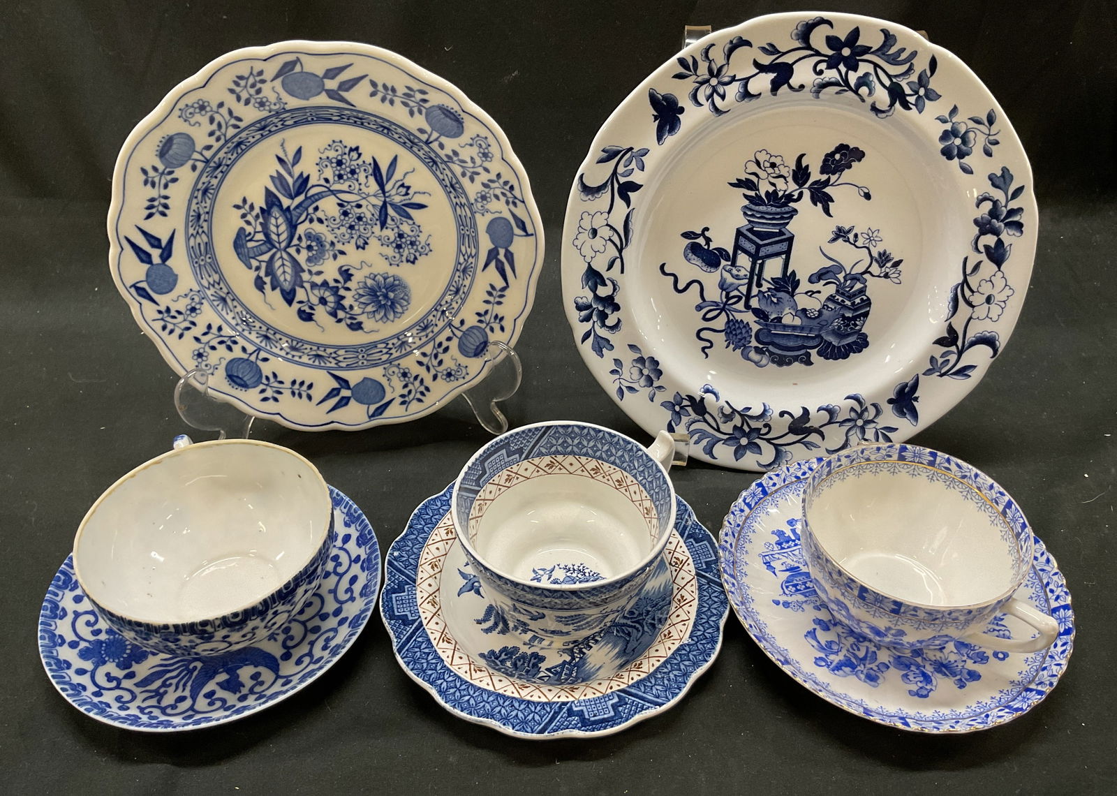Lot 8 Copeland Spode+ Tableware England: Lot of 8 pieces. Includes 1 Copeland Spode New Stone plate, stamped and marked, made in England. 1 Hutschenreuther porcelain plate, stamped and marked, made in Germany dated 1814. 3 porcelain teacups