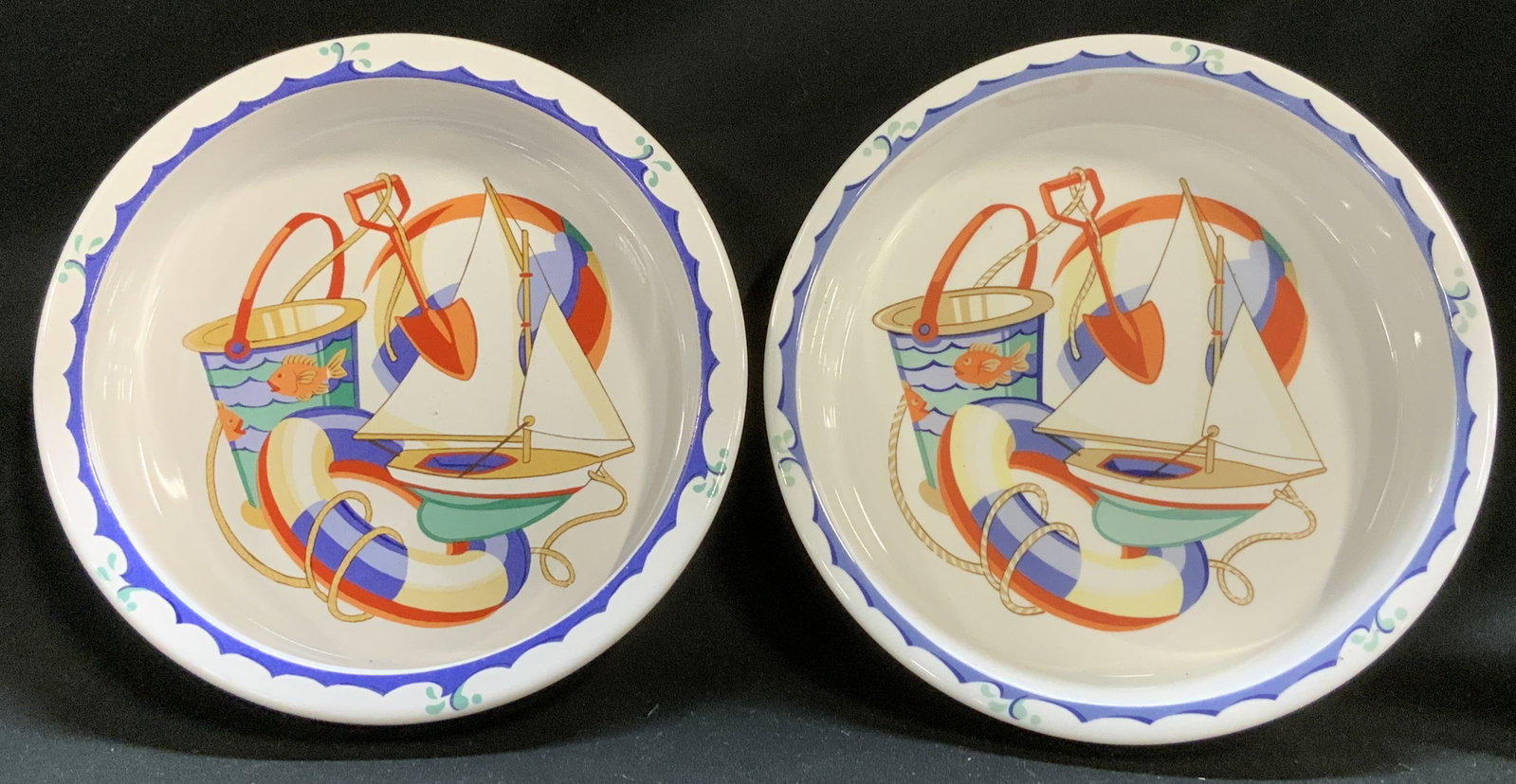 Set2 Tiffany Seashore by Tiffany & Co Bwls JAPAN: Bowl features a beach/ocean design with sailboats, fish, beach balls, & sand buckets. Signed & marked on underside. Reads, TIFFANY & CO. TIFFANY SEASHORE. DESIGNED IN THE U.SA. MADE IN JAPAN. Surface 