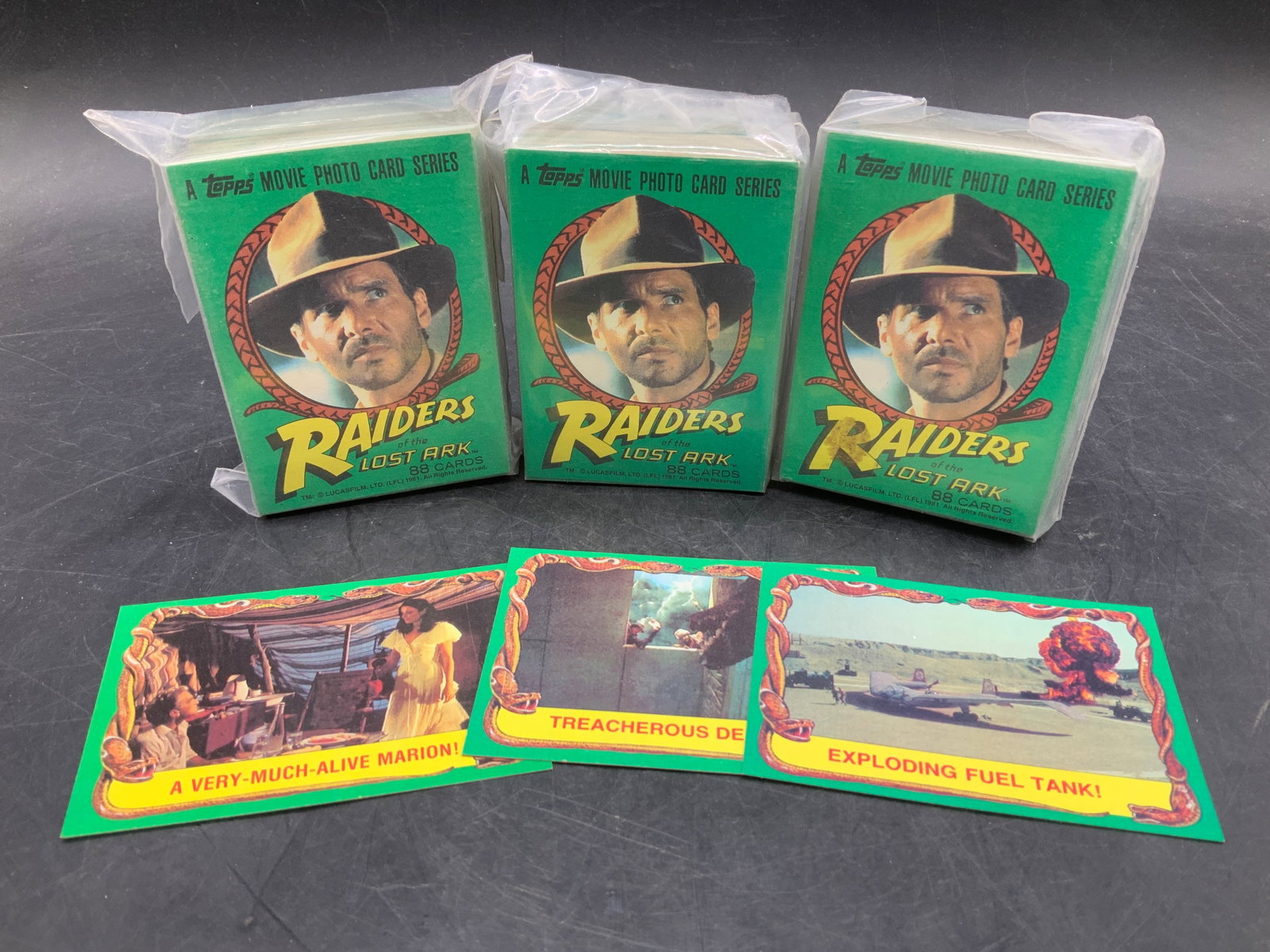 Lot 40+ TOPPS Raiders of Lost Ark 1981 Cards: Lot includes, 40+ TOPPS Raiders of the Lost Ark (1981). Cards feature images of various characters & scenes. Cards have not been inspected individually. Lot is sold as is. Surface wear consistent to a