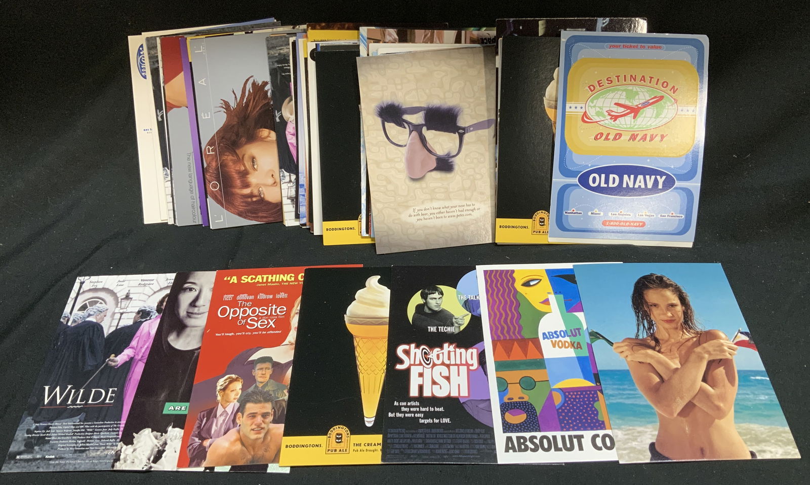 Lot 30+ Advertising Film & Movie Postcards MAX: Lot includes, 30+ advertising film & movie postcards. Postcards feature various images of movies, models, characters & more, including DC superheros, LOreal, absolut vodka, shooting fish, the opposite