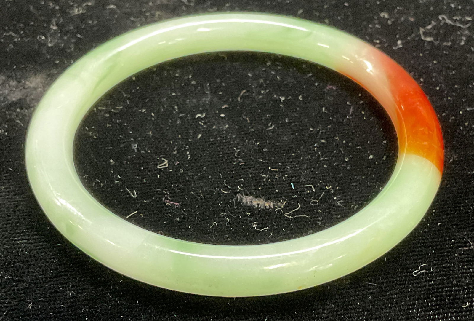 Jadeite Glass Bangle Bracelet: Jadeite toned glass bangle bracelet. Measures approx 2.25 inches wide. Some scratching. Jewelry, estate jewelry, costume jewelry, cocktail jewelry, fashion jewelry, accessories, fashion accessories, w