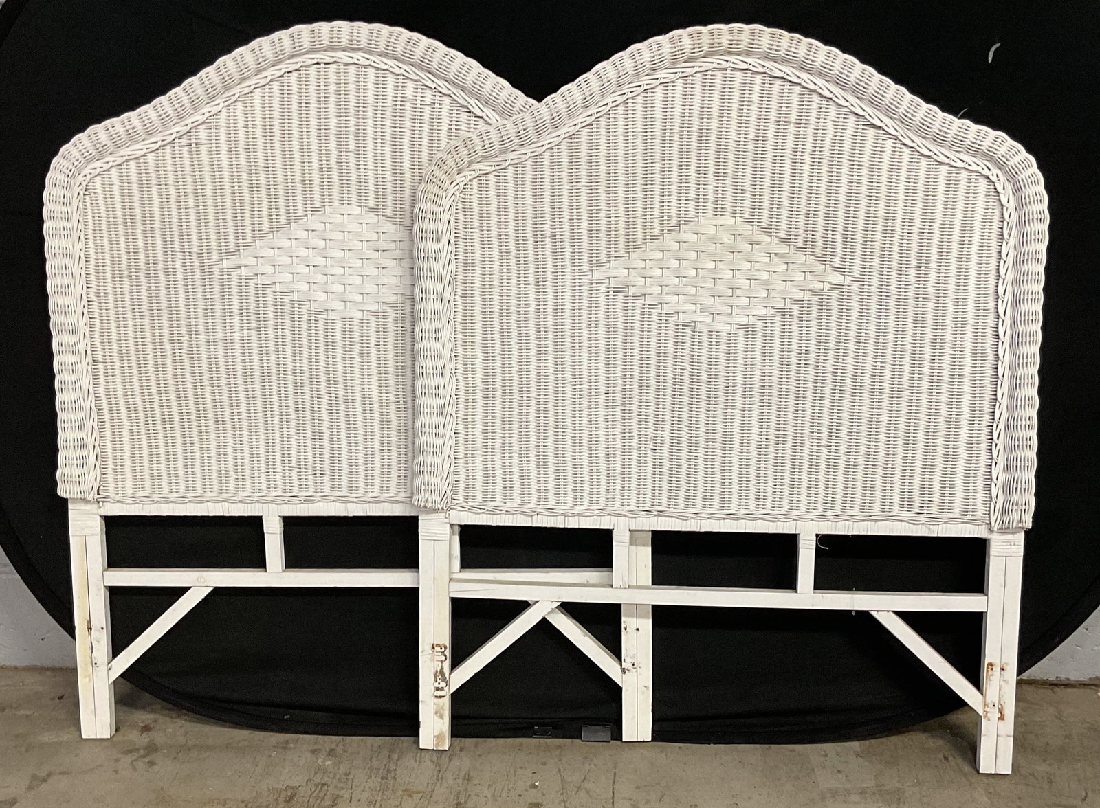 Pair Vintage White Wicker Twin Size Headboards: Pair of vintage white woven wicker wooden twin size headboards with curved tops and diamond design. Measures approx 39 x 47 inches. Wear including scratching. Headboards, wicker headboards, white head