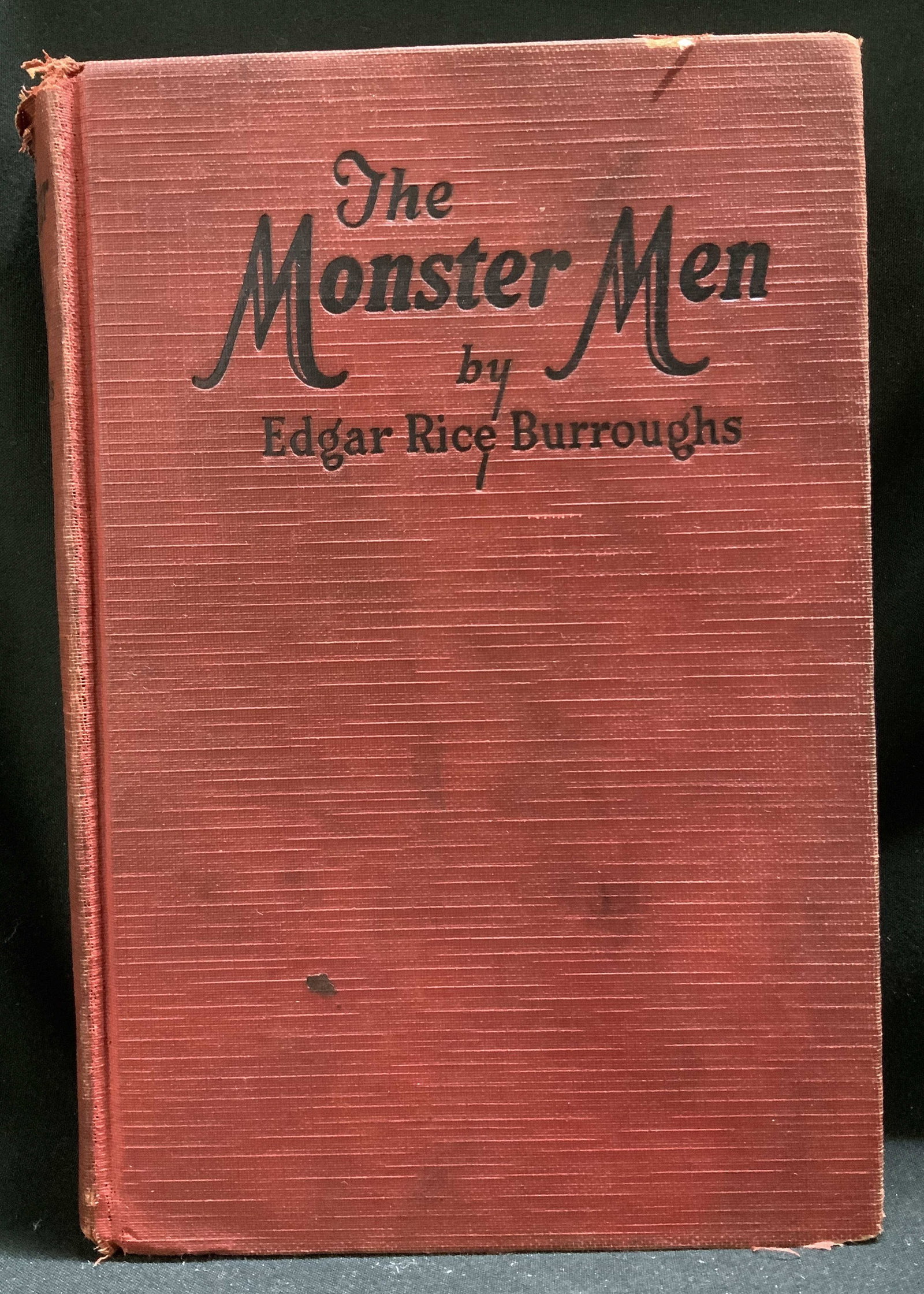 1929 The Monster Men Book Edgar Rice BURROUGHS: The Monster Men by Edgar Rice Burroughs. Grosset & Dunlap. Publishers New York. Copyright in the USA. 1929 by Edgar Rice Burroughs. Front cover is red toned. Surface wear consistent to age, use & expo