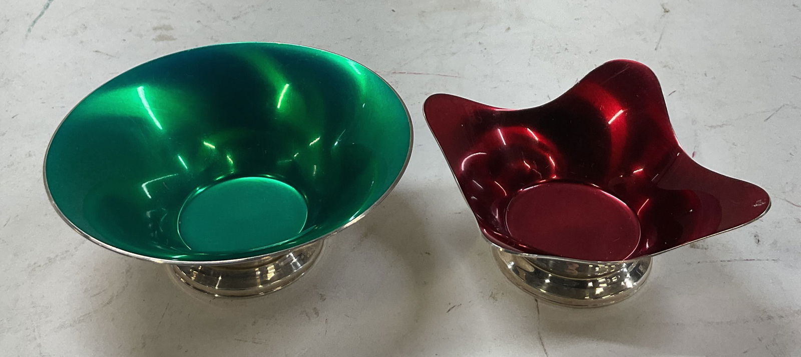 Lot 2 Meka Silver Plated & Enamel Bowls Denmark: Lot of 2 Meka silver plated red and green enameled bowls. Made in Denmark. Marked on underside, reads Meka Denmark. Pedestal base bowl with silver plated green enamel. Pedestal base bowl with flared s