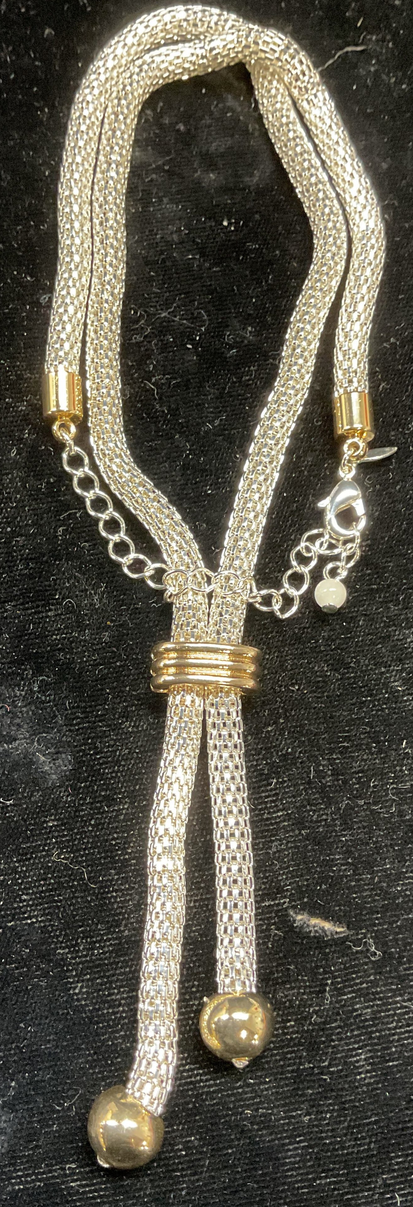 Signed NRQ Silver Tone Mesh Chain Necklace: Signed NRQ silver tone mesh chain necklace with gold tone accents. Drop length approx 10.25 inches. Some scratching. Jewelry, estate jewelry, costume jewelry, cocktail jewelry, fashion jewelry, access