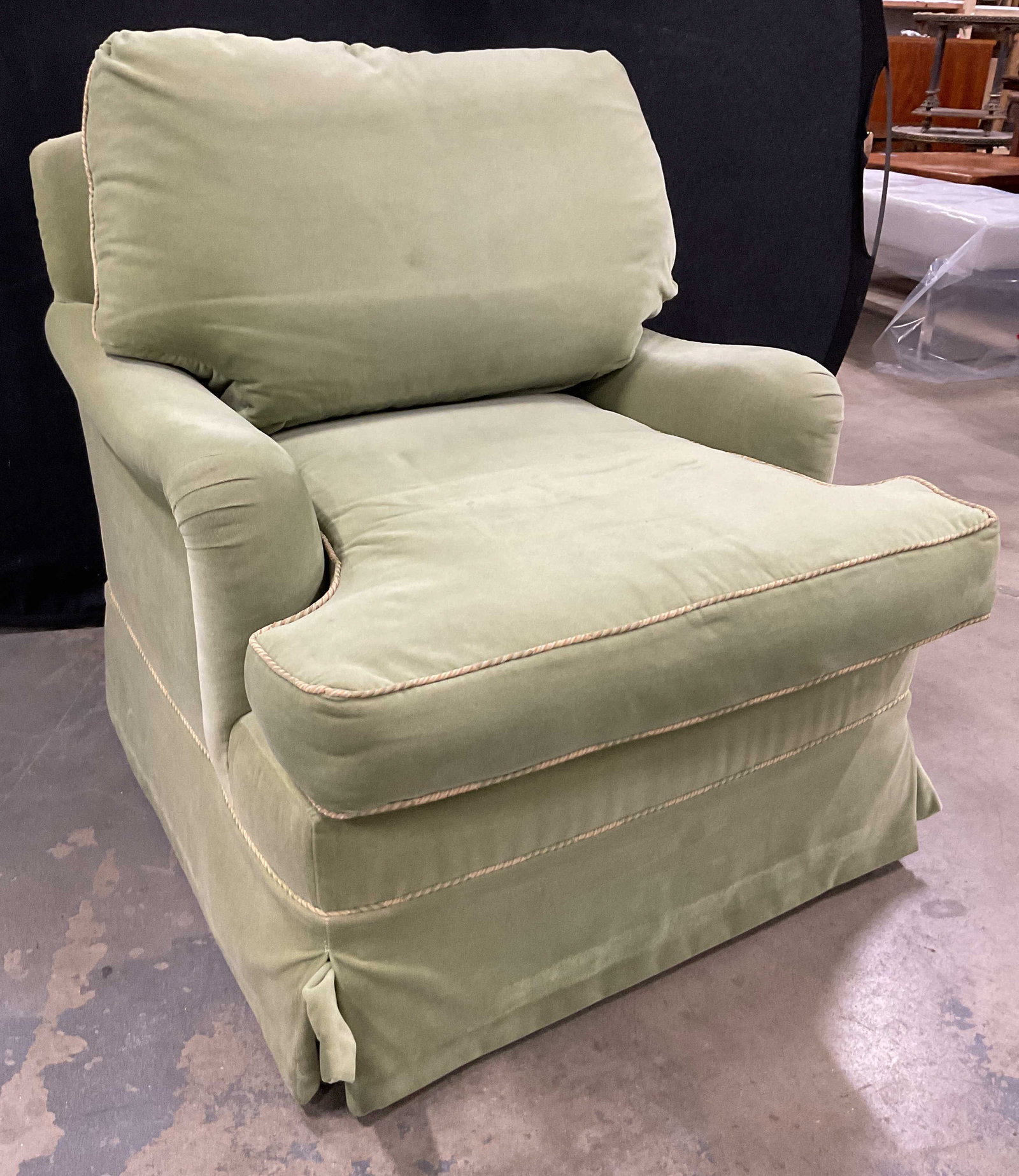 Vintage Sage Green Velvet Upholstered Club Chair: Vintage sage green velvet upholstered club chair. Feels like velvet. Features silk embroidered braid rope accent. Has back and seat cushions. Sits on a swiveled base. Measures approx 30 x 31 1/2 x 30