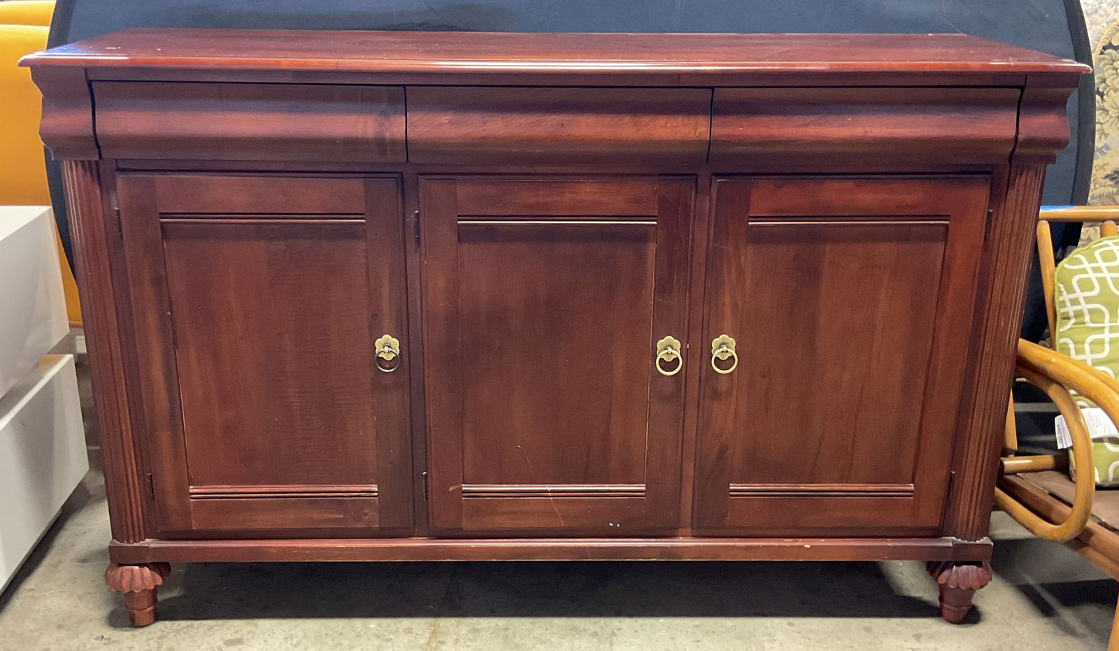 Ethan Allen British Classics Wood Sideboard USA: Ethan Allen British Classics wood sideboard with 3 doors and 3 drawers. Decorative brass handles. Signed. Made in USA. Measures approx 63.5 x 19 x 40 inches. Some scratching. Ethan Allen sideboard, Br