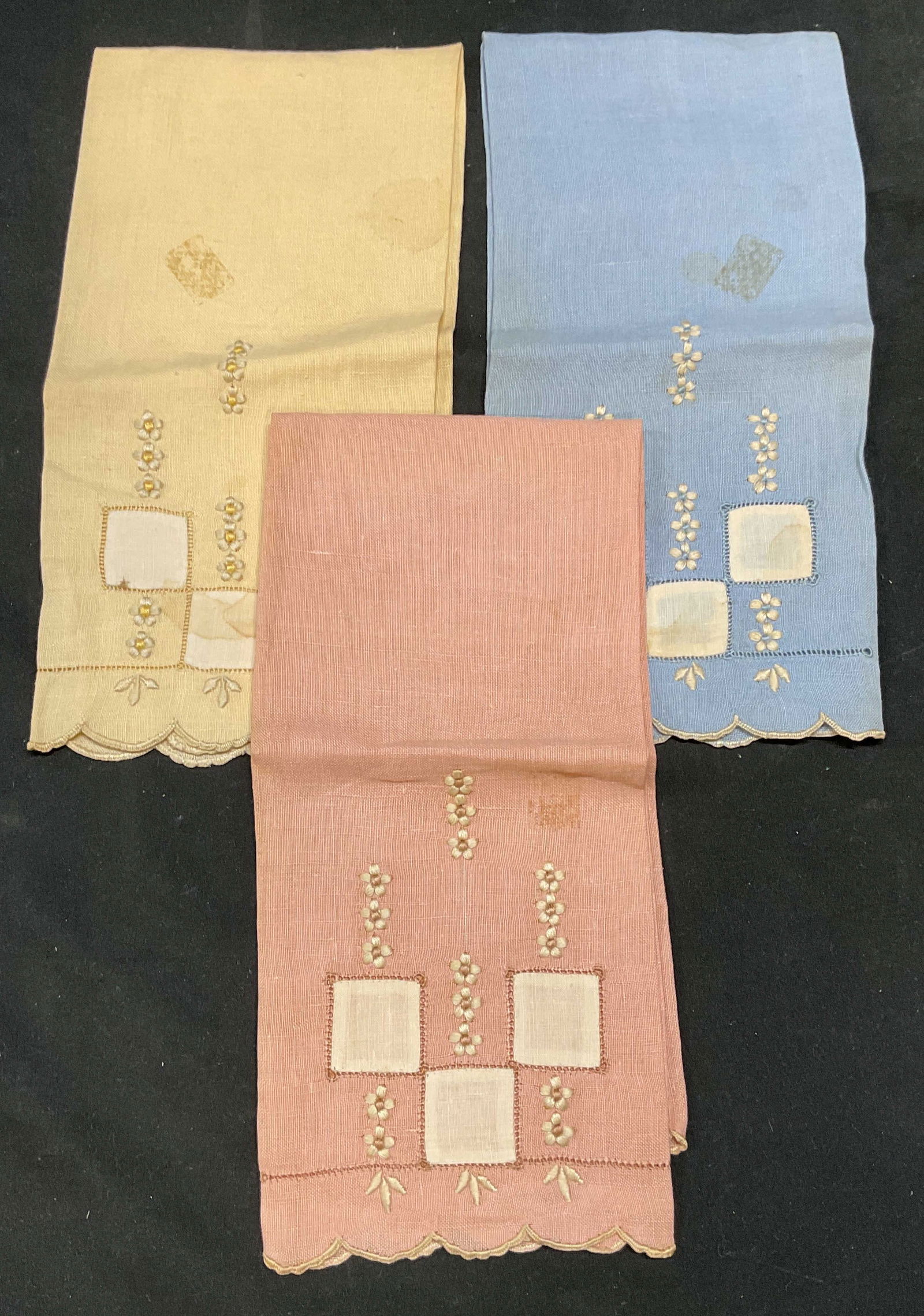 Set 3 Pink, Yellow, Blue Floral Linen Tea Towels: Set of 3 pink, blue, and yellow linen tea towels with embroidered floral designs. Measure approx 19 x 13.5 inches. Some blemishes. Tea towel, linen tea towel, floral tea towel, home decor, home access