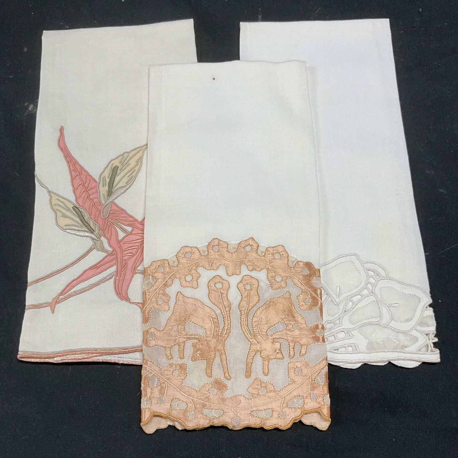 Lot 3 Vintage White Linen Floral Tea Towels: Lot of 3 vintage white linen tea towels with floral and scroll embroidery designs. Pink and white floral tea towel measures approx 21 x 13.5 inches. Some blemishes. Tea towel, vintage tea towel, white