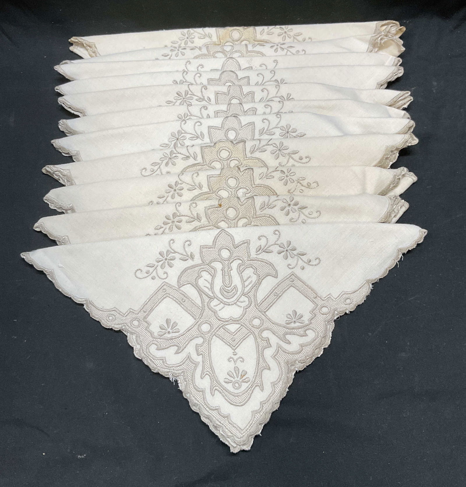 Set 11 Vintage Beige Embroidered Linen Napkins: Set of 11 beige linen napkins with embroider floral scroll design. Measure approx 20 x 20 inches. Some blemishes. Linen napkins, beige napkins, floral napkins. Embroidered napkins, home decor, home ac
