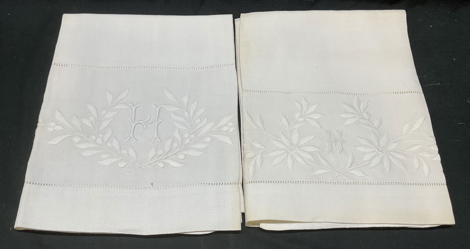 Lot 2 White Linen Embroidered Tea Towels: Lot of 2 vintage white linen tea towels with embroidered monogram H and botanical designs. Measure approx 42 x 24 inches. Some blemishes. Tea towel, white tea towel, linen tea towel, vintage tea towel