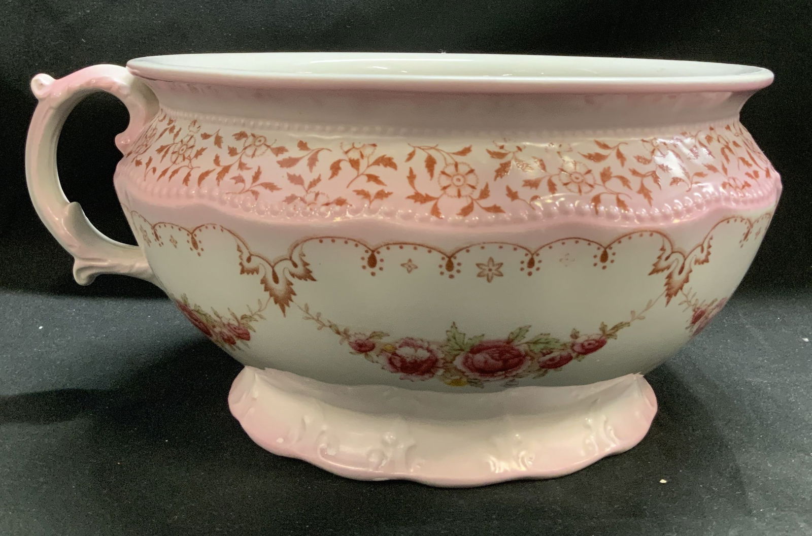 Vntg Hand Painted Floral Porcelain Chamber Pot: Vntg Hand Painted Floral Porc Planter Vessel Chamber Pot. Planter appears to be porcelain material & features hand-painted pink floral motifs. Signed & marked on underside. Visible trademark but not l