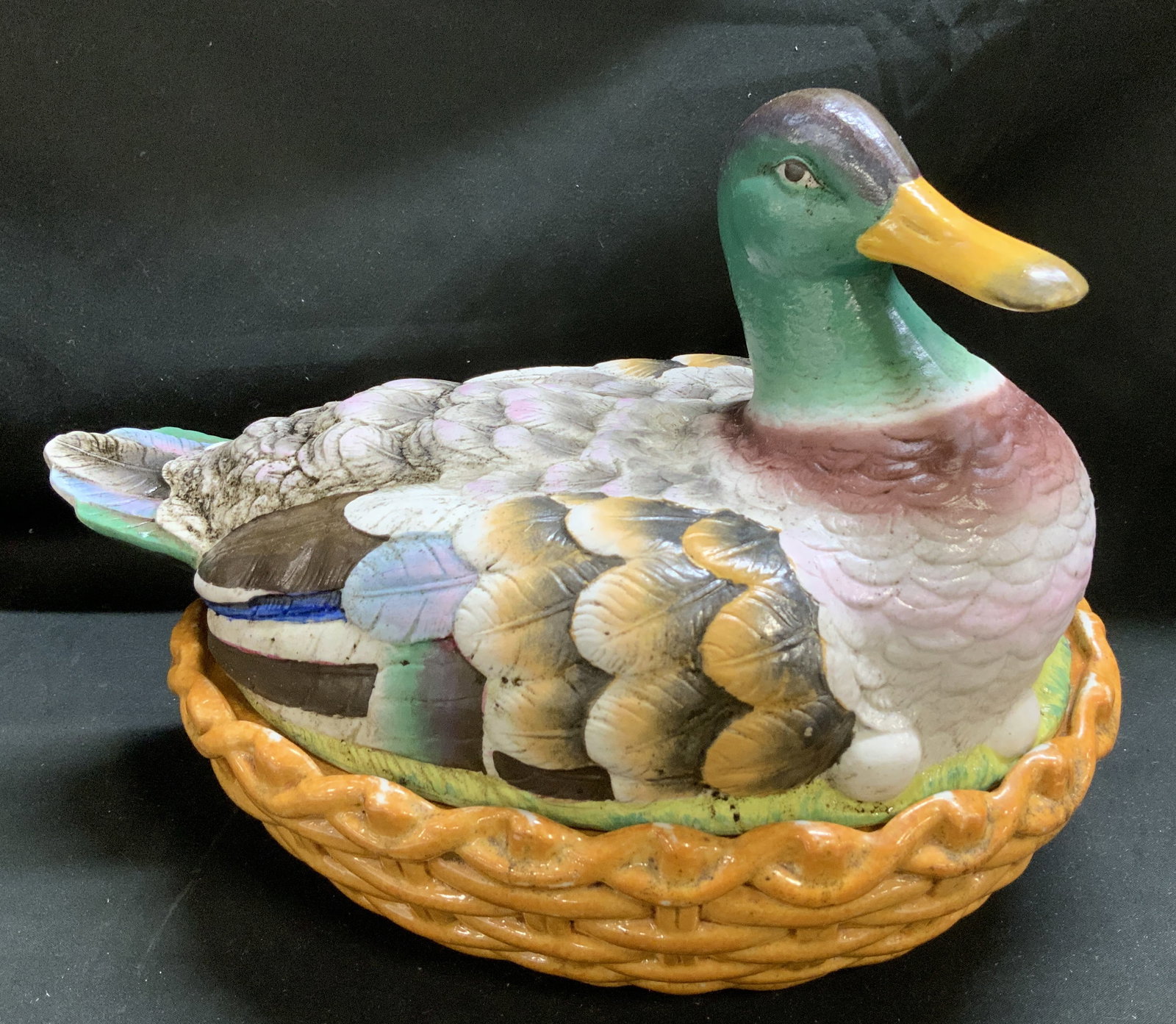 Vntg Mallard Duck Porcelain Lidded Tureen: Lid of tureen is shaped like a mallard Duck & the base resembles a woven basket. Hand-painted details & porcelain material. No visible signature or markings. Surface wear consistent to age, use & expo