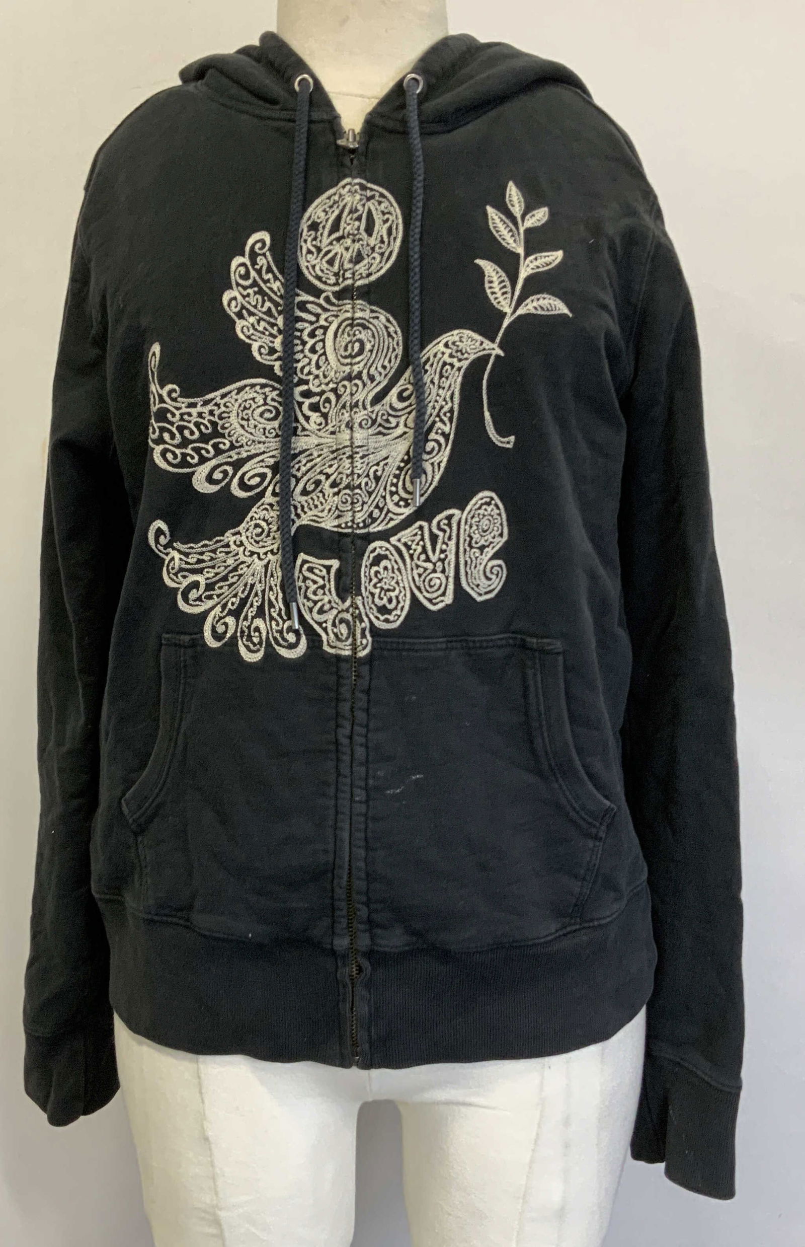 Lucky Brand Embroidered Peace Dove Zip Up Hoodie: Black zip-up hoodie features a white embroidered peace dove and LOVE graphic. Intricate detailing on dove. Zipper closure & two front pouches. Cotton & size M. Signed & marked. Reads, LUCKY BRAND. Sur