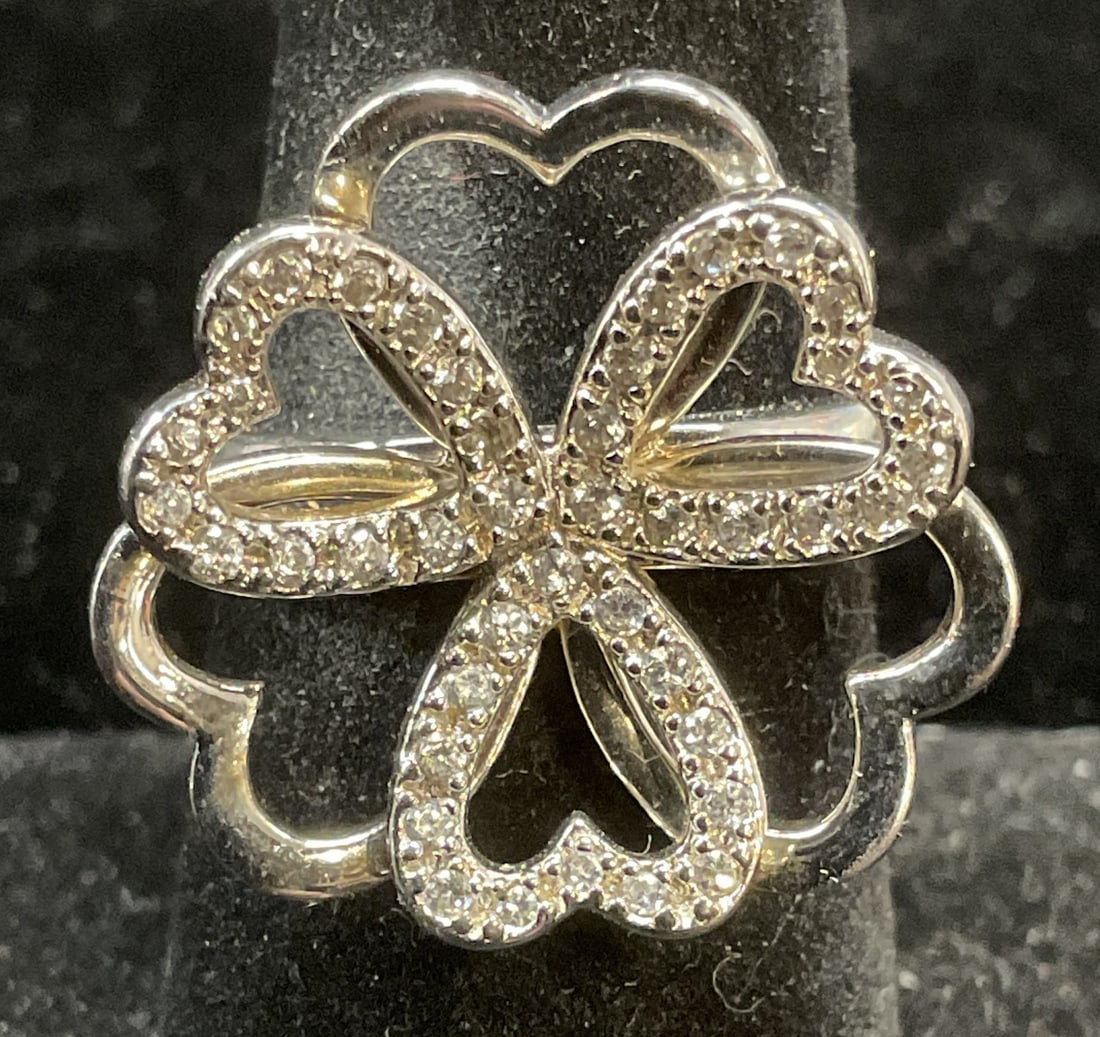 Sterling Silver Cubic Zirconia Heart Ring: Sterling silver and cubic zirconia heart motif ring. Marked sterling. Size 7. Total weight 6.7 grams. Some scratching. Jewelry, estate jewelry, fine jewelry, cocktail jewelry, fashion jewelry, accesso