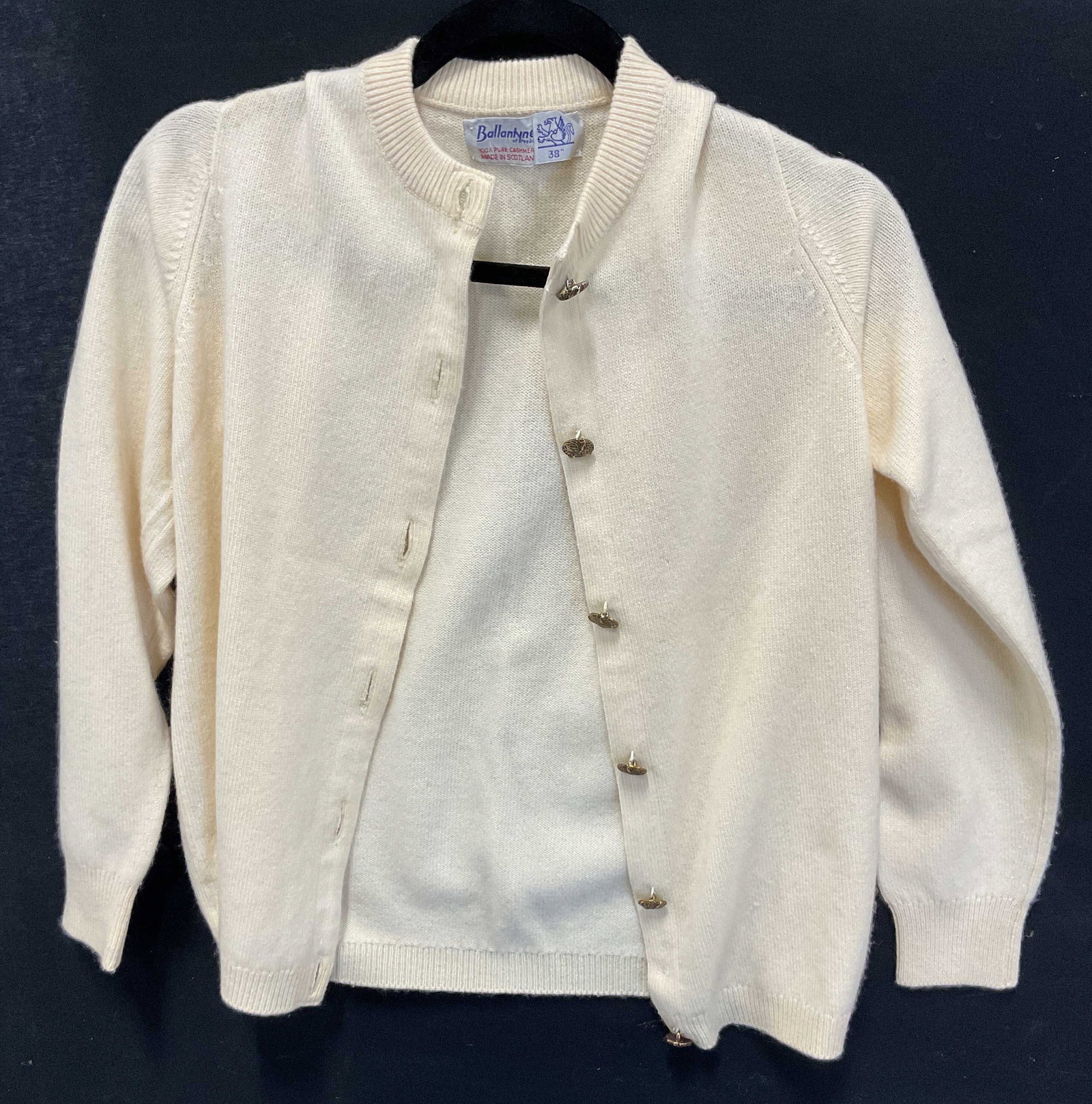 Ballantyne Of Peebles Cashmere Cardigan Scotland: Ballantyne of Peebles white cashmere buttoned sweater cardigan. Made in Scotland. Size 38. 100% pure cashmere material. Tag reads Made In Scotland Expressly For Bergdorf Goodman On The Plaza New York 