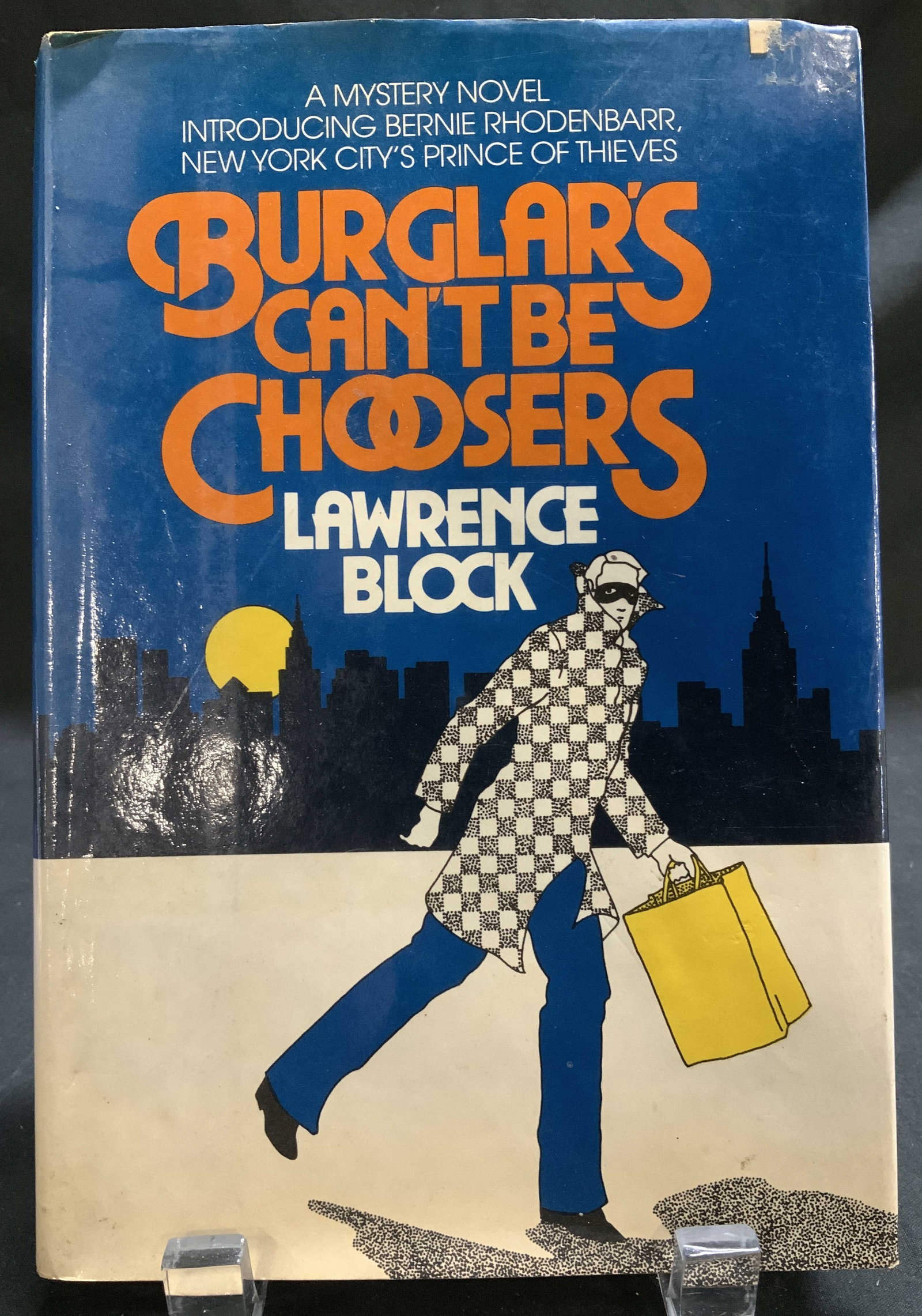 1977 Burglars Cant Be Choosers 1st Ed Book L BLOCK: Burglars Cant Be Choosers by Lawrence Block. Random House, NY. Copyright 1977. First Edition. Manufactured in the USA. Front cover features an illustration of a burglar. Surface wear consistent to age