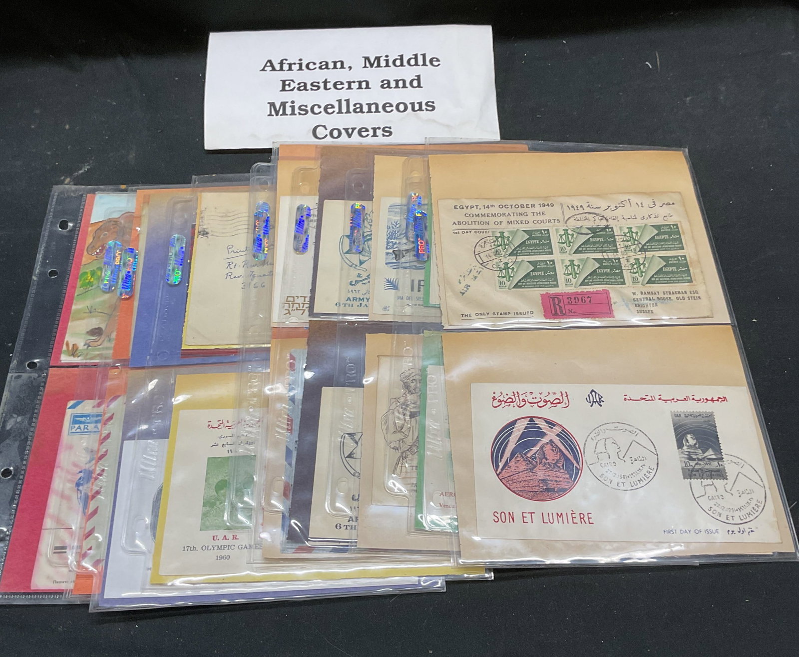 Group Lot Vtg Africa Middle East Covers & Stamps: Group lot of 10+ vintage African, Middle East and more first day covers and vintage stamps. Includes Military, Sphinx, political and more. Sizes vary. Most covers approx 6.5 x 3.5 inches. Some wear to