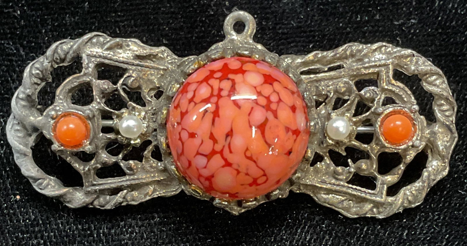 Vintage Silver Tone Red Glass Cabochon Brooch: Vintage silver tone brooch with red glass cabochons, faux coral, and faux seed pearls. Measures approx .75 x 2 inches. Some scratching. Jewelry, estate jewelry, costume jewelry, cocktail jewelry, fash
