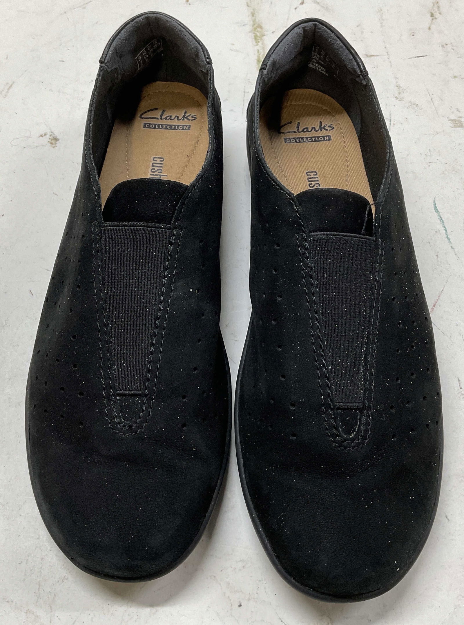 Clarks Collection Black Soft Cushion Shoes: Clarks Collection black soft cushion shoes. Size 8 1/2. Dotted hole design. Feels like suede. Wear consistent with exposure. Shoes, loafers, slip on shoes, Clarks Collection shoes, black shoes, womens